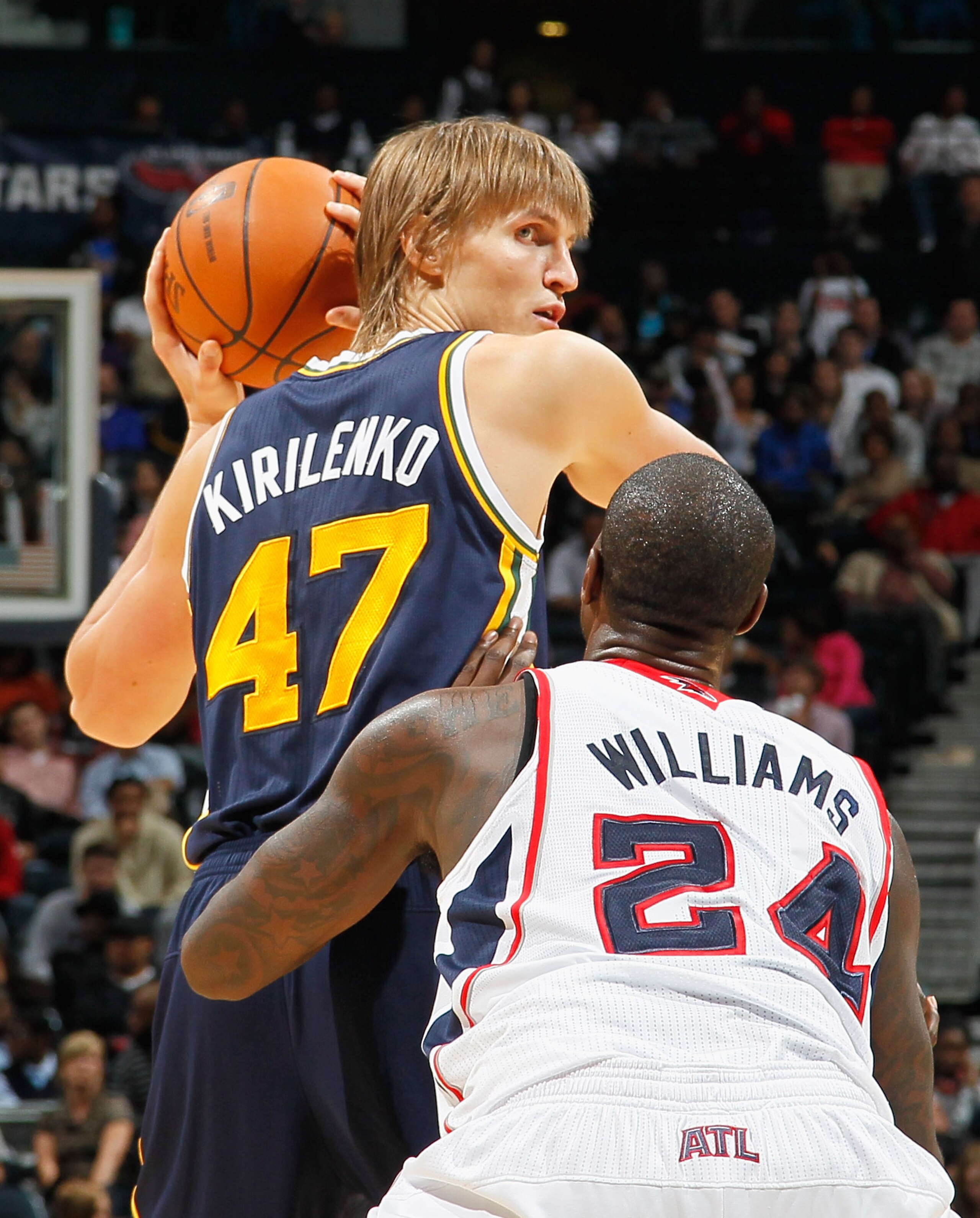 ATLANTA - NOVEMBER 12:  Andrei Kirilenko #47 of the Utah Jazz against Marvin Williams #24 of the Atlanta Hawks at Philips Arena on November 12, 2010 in Atlanta, Georgia.  NOTE TO USER: User expressly acknowledges and agrees that, by downloading and/or usi