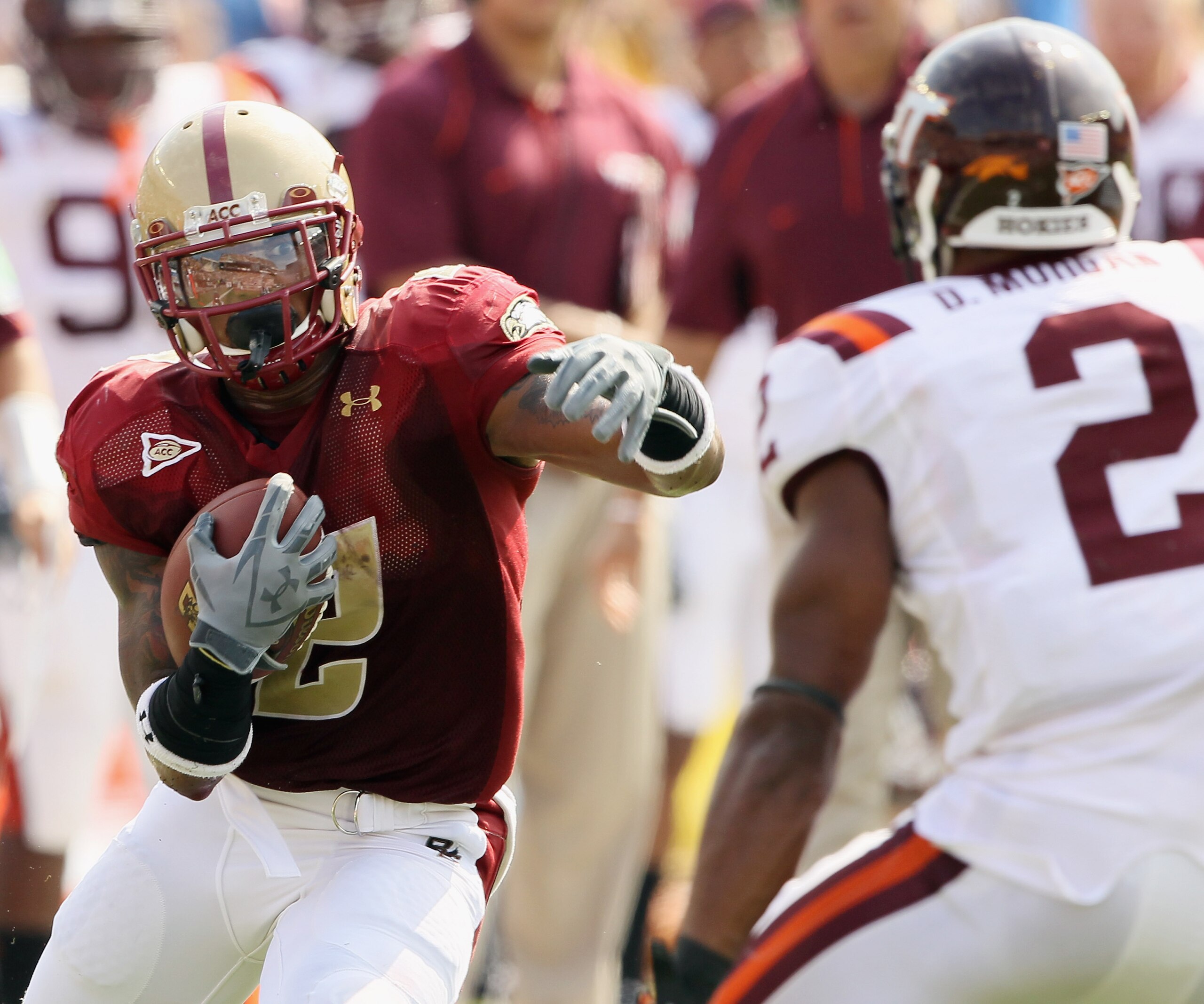 CHESTNUT HILL, MA - SEPTEMBER 25: Montel Harris #2 of the Boston College Eagles carries the ball and tries to manuever around Davon Morgan #2 of the Virginia Tech Hokies on September 25, 2010 at Alumni Stadium in Chestnut Hill, Massachusetts. (Photo by CHESTNUT HILL, MA - SEPTEMBER 25: Montel Harris #2 of the Boston College Eagles carries the ball and tries to manuever around Davon Morgan #2 of the Virginia Tech Hokies on September 25, 2010 at Alumni Stadium in Chestnut Hill, Massachusetts. (Photo by