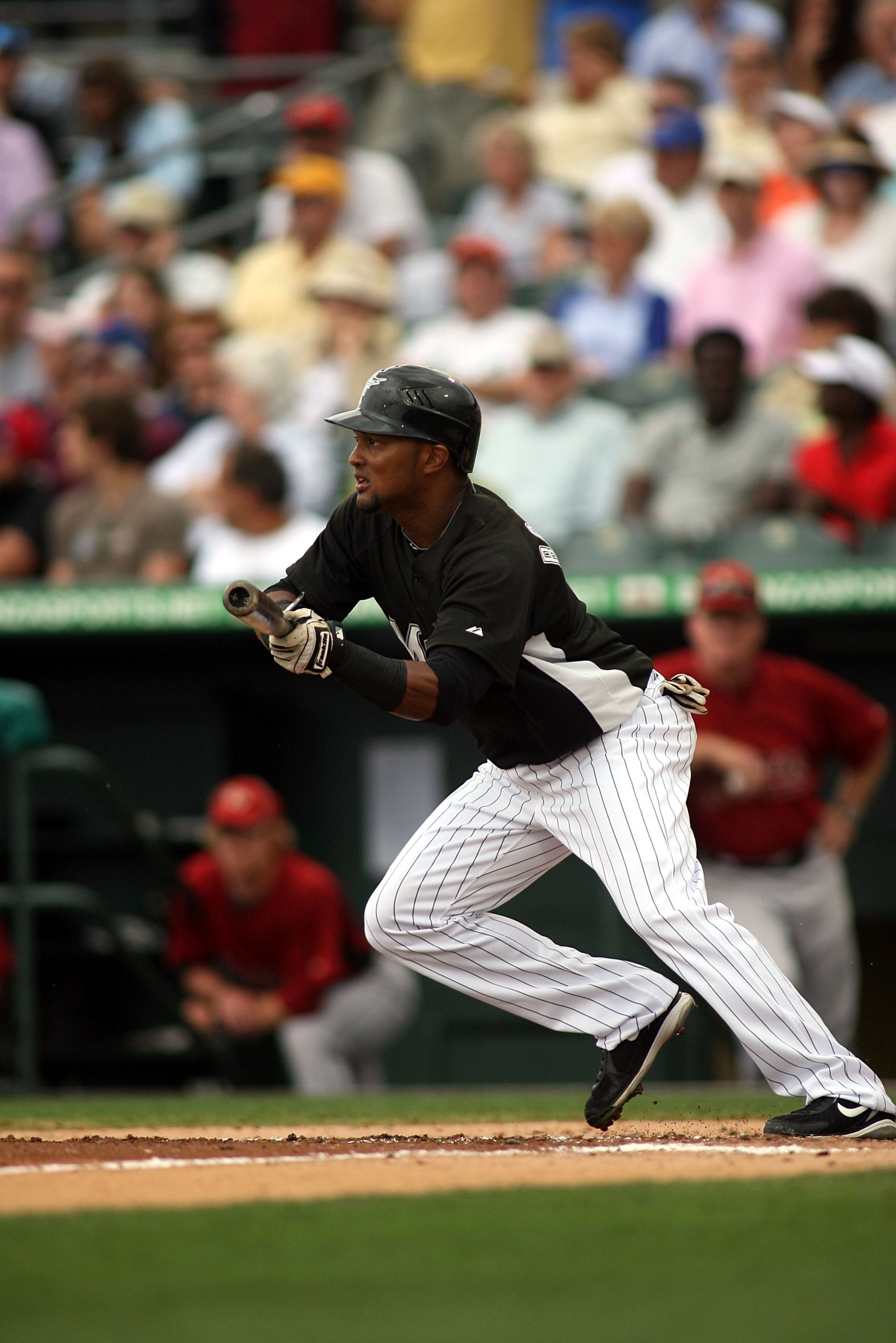 JUPITER, FL - MARCH 28:  Emilio Bonifacio #1 of the Florida Marlins bats against the Houston Astros on March 28, 2010 in Jupiter, Florida.  (Photo by Marc Serota/Getty Images)
