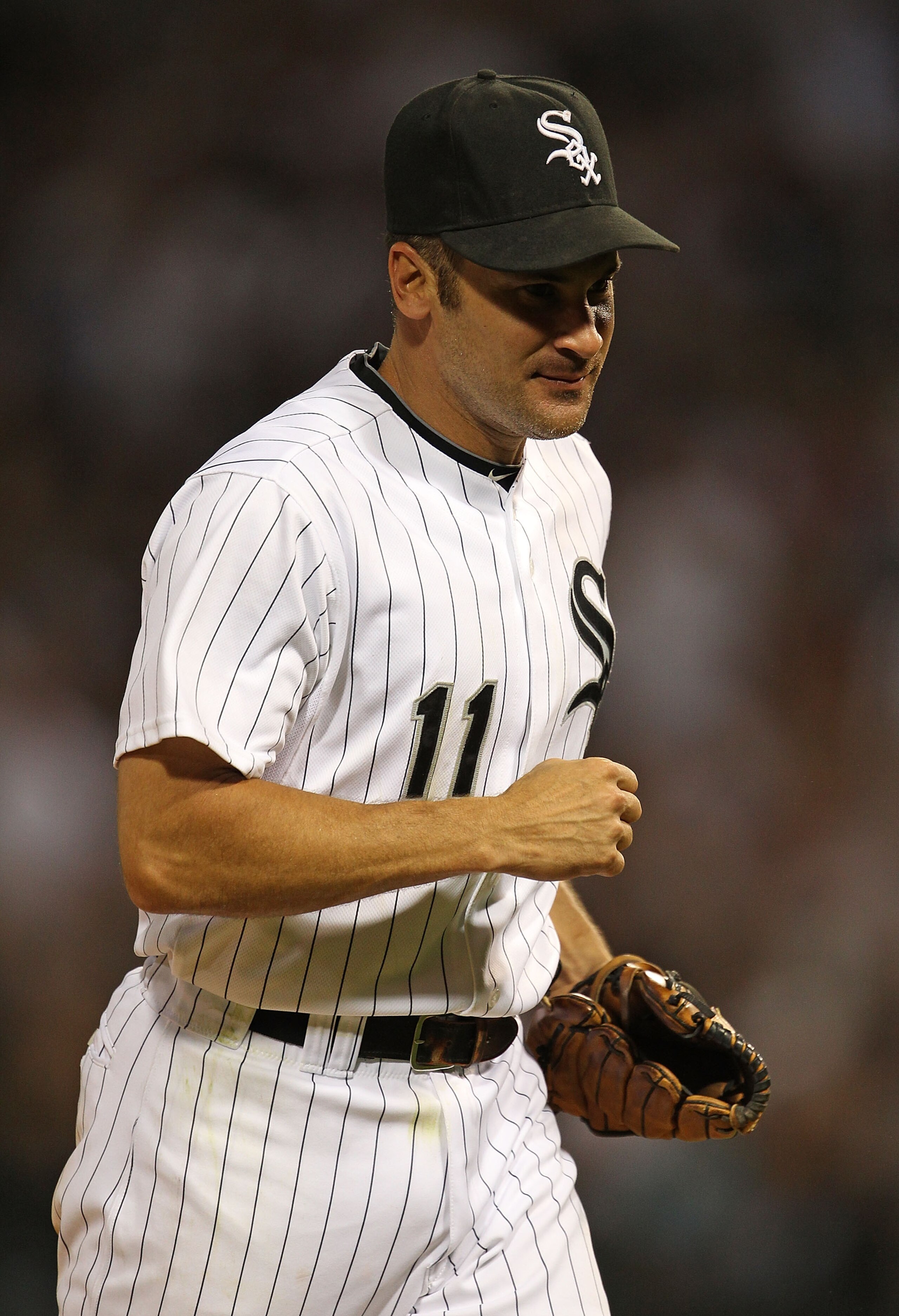 CHICAGO - JULY 26: Omar Vizquel #11 of the Chicago White Sox runs off the field against the Seattle Mariners at U.S. Cellular Field on July 26, 2010 in Chicago, Illinois. The White Sox defeated the Mariners 6-1. (Photo by Jonathan Daniel/Getty Images) CHICAGO - JULY 26: Omar Vizquel #11 of the Chicago White Sox runs off the field against the Seattle Mariners at U.S. Cellular Field on July 26, 2010 in Chicago, Illinois. The White Sox defeated the Mariners 6-1. (Photo by Jonathan Daniel/Getty Images)