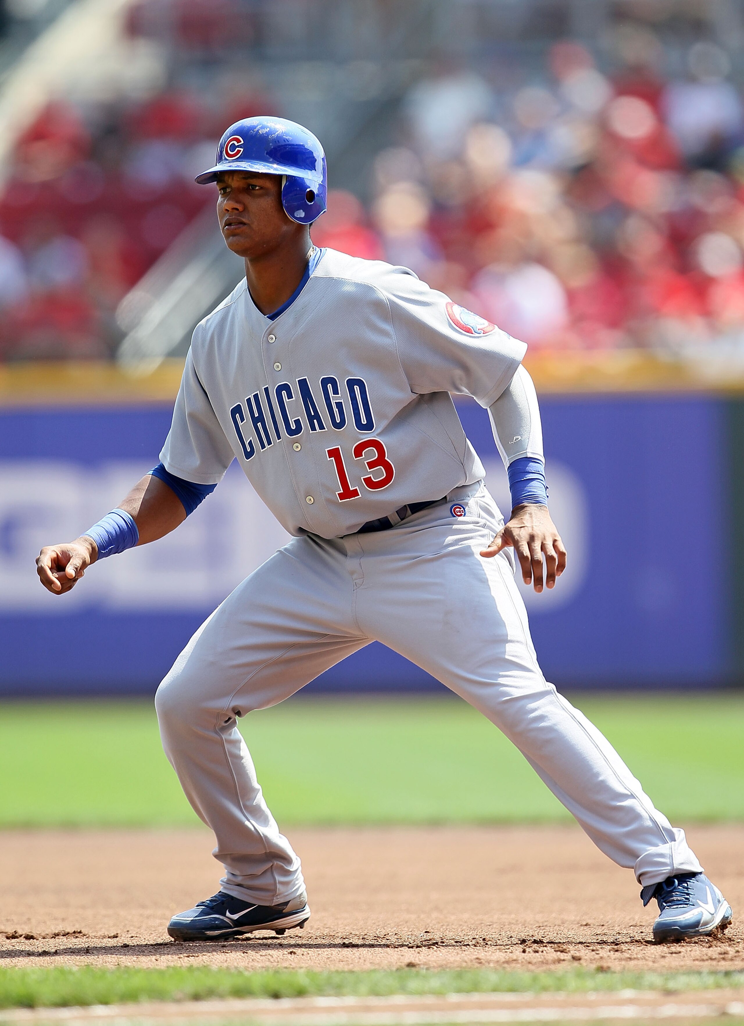CINCINNATI - AUGUST 29:  Starlin Castro #13 of the Chicago Cubs leads off of first base during the game against the Cincinnati Reds at Great American Ball Park on August 29, 2010 in Cincinnati, Ohio.  (Photo by Andy Lyons/Getty Images)