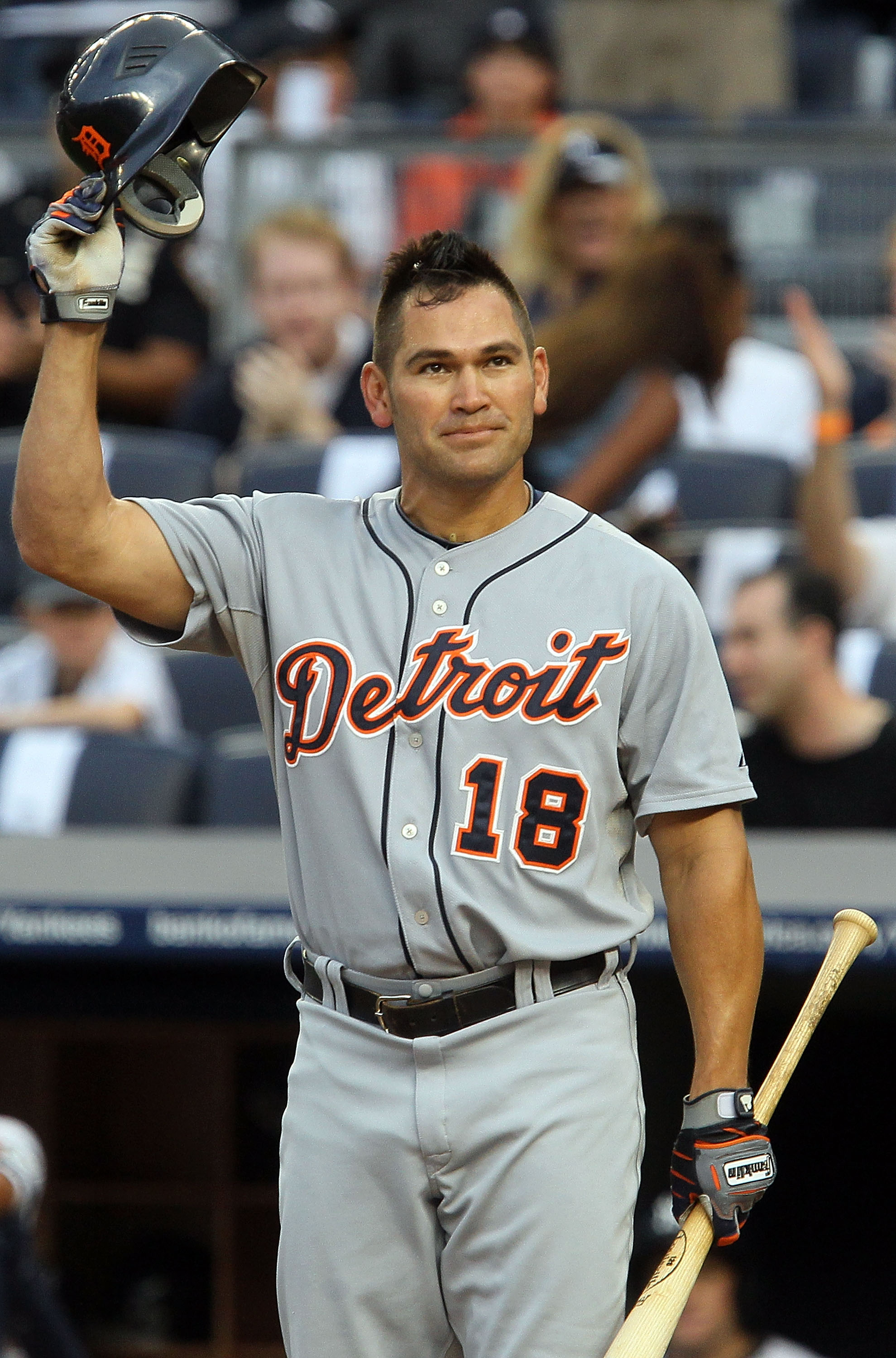 NEW YORK - AUGUST 16:  Johnny Damon #18 of the Detroit Tigers salutes the crowd prior to his first at bat against the New York Yankees on August 16, 2010 at Yankee Stadium in the Bronx borough of New York City.  (Photo by Jim McIsaac/Getty Images)