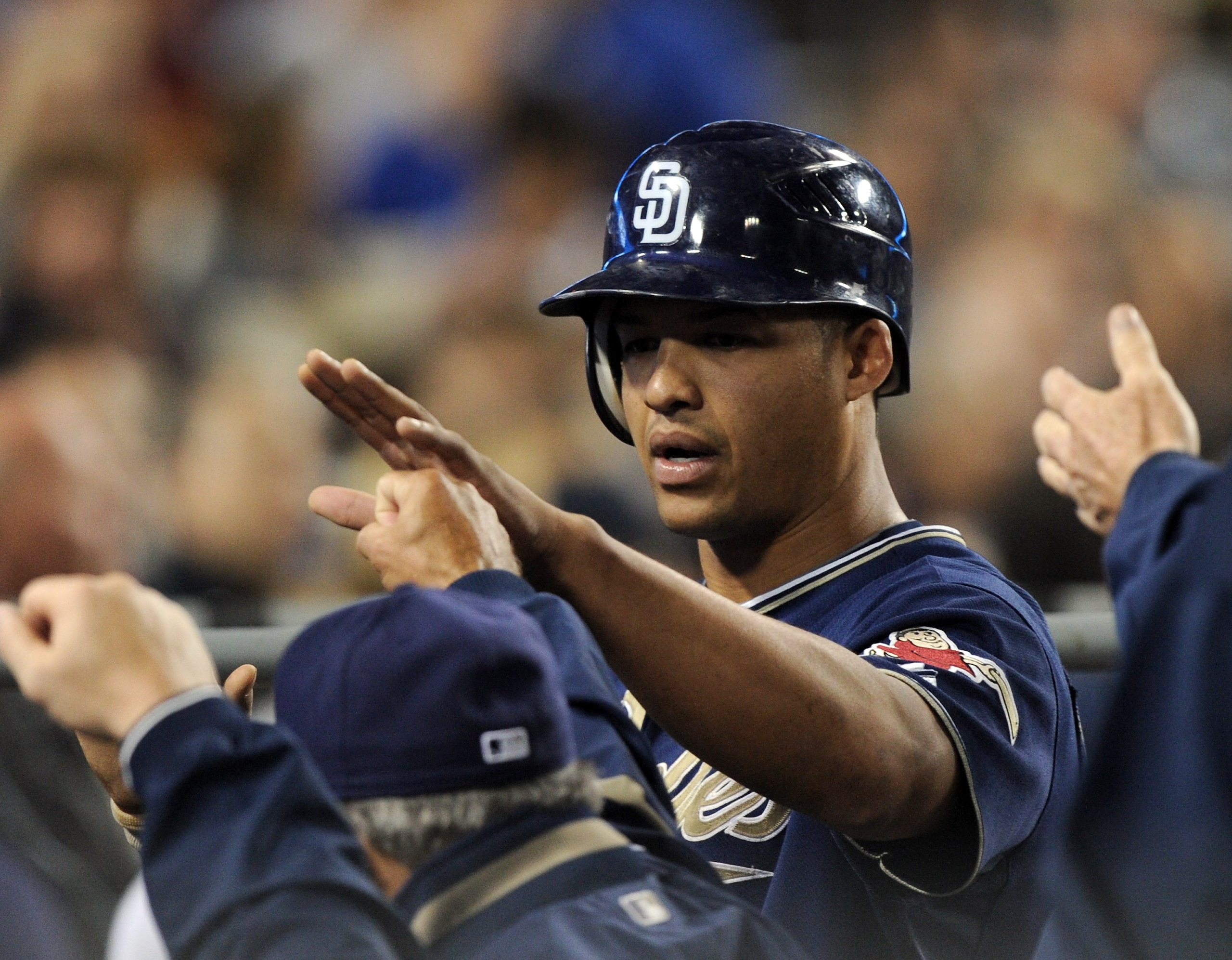 LOS ANGELES, CA - SEPTEMBER 21:  Will Venable #25 of the San Diego Padres celebrates his run with the bench for a 3-0 lead over the Los Angeles Dodgers during the fifth inning at Dodger Stadium on September 21, 2010 in Los Angeles, California.  (Photo by