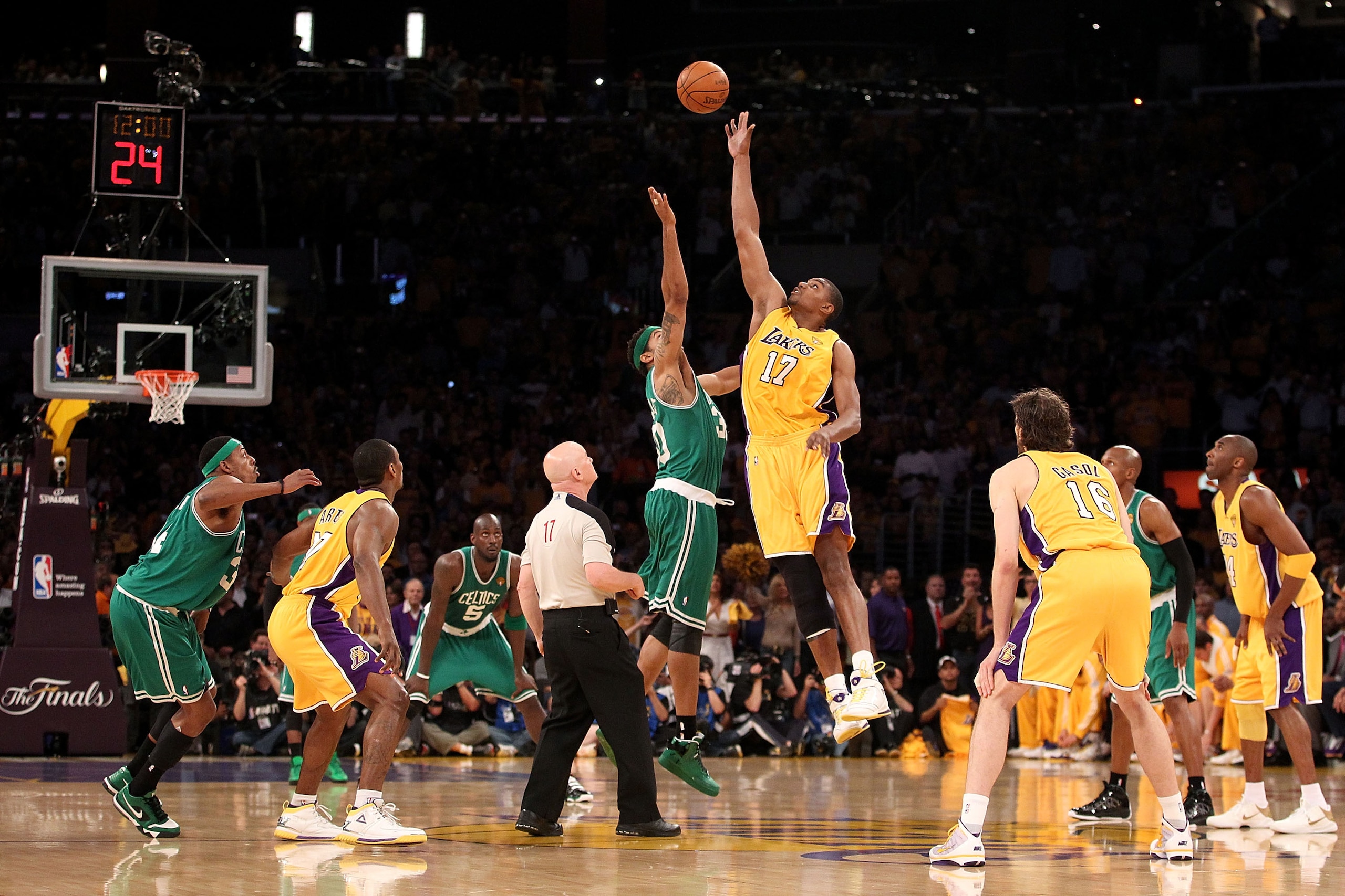 LOS ANGELES, CA - JUNE 17:  Andrew Bynum #17 of the Los Angeles Lakers tips off against Rasheed Wallace #30 of the Boston Celtics in Game Seven of the 2010 NBA Finals at Staples Center on June 17, 2010 in Los Angeles, California.  NOTE TO USER: User expre