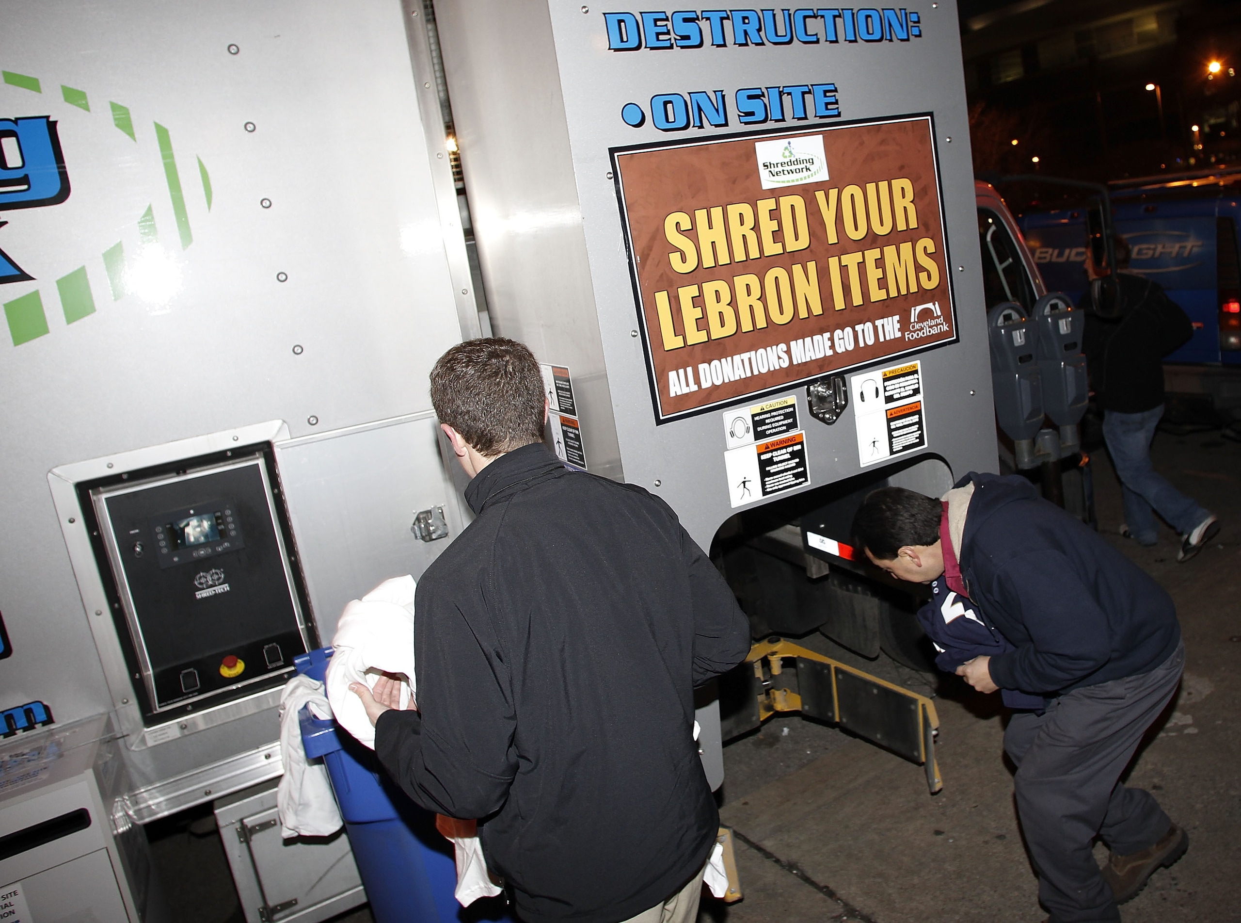 CLEVELAND, OH - DECEMBER 02:  Fans shred there LeBron James gear prior to the Cleveland Cavaliers playing the Miami Heat at Quicken Loans Arena on December 2, 2010 in Cleveland, Ohio. NOTE TO USER: User expressly acknowledges and agrees that, by downloadi