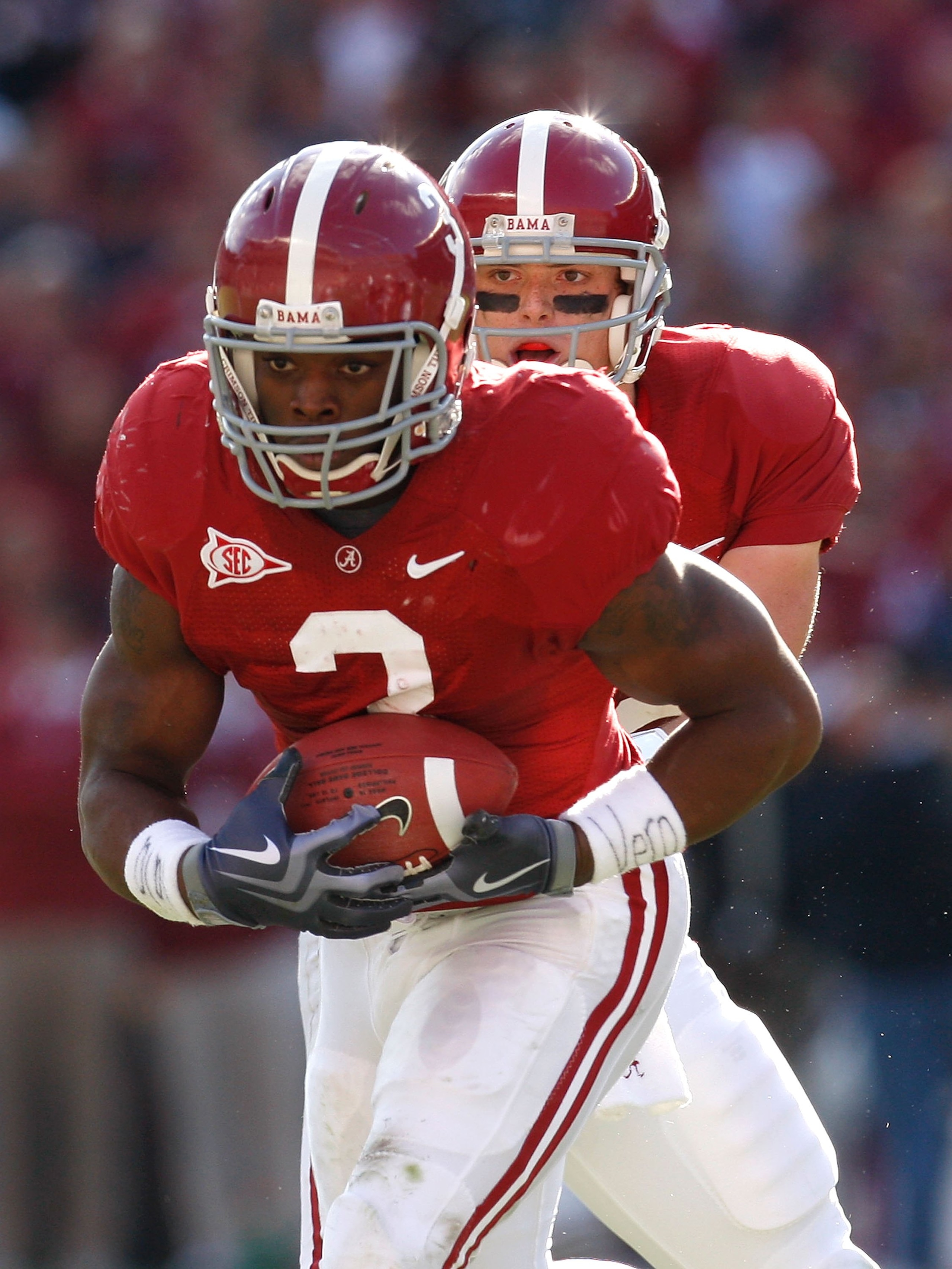 TUSCALOOSA, AL - OCTOBER 24: Quarterback Greg McElroy #12 and Trent Richardson #3 of the Alabama Crimson Tide against the Tennessee Volunteers at Bryant-Denny Stadium on October 24, 2009 in Tuscaloosa, Alabama. (Photo by Kevin C. Cox/Getty Images) TUSCALOOSA, AL - OCTOBER 24: Quarterback Greg McElroy #12 and Trent Richardson #3 of the Alabama Crimson Tide against the Tennessee Volunteers at Bryant-Denny Stadium on October 24, 2009 in Tuscaloosa, Alabama. (Photo by Kevin C. Cox/Getty Images)
