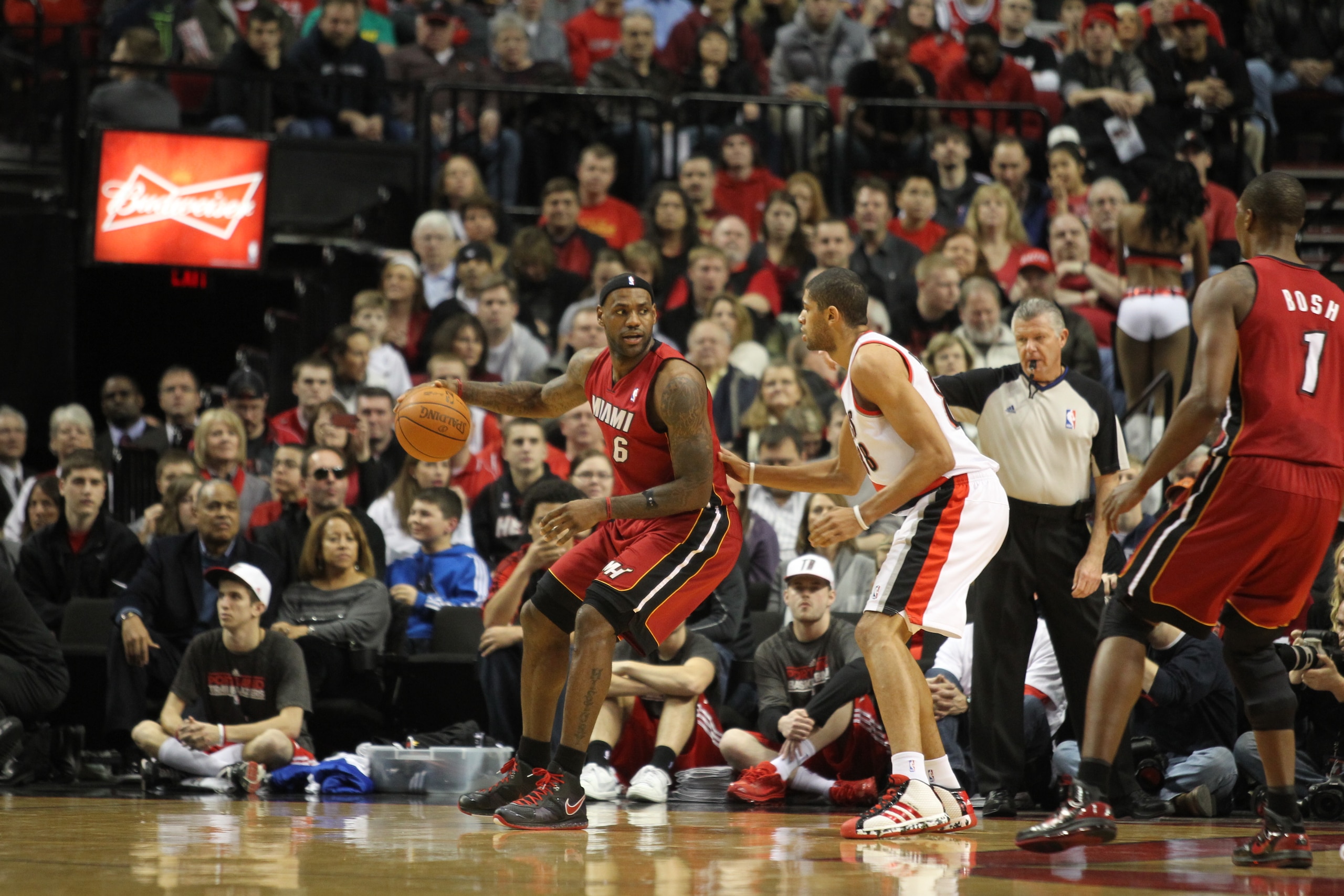 PORTLAND, OR - JANUARY 09: LeBron James #6 of the Miami Heat posts up against Nicolas Batum #88 of the Portland Trail Blazers during a game on January 9, 2011 at the Rose Garden Arena in Portland, Oregon. NOTE TO USER: User expressly acknowledges and agre