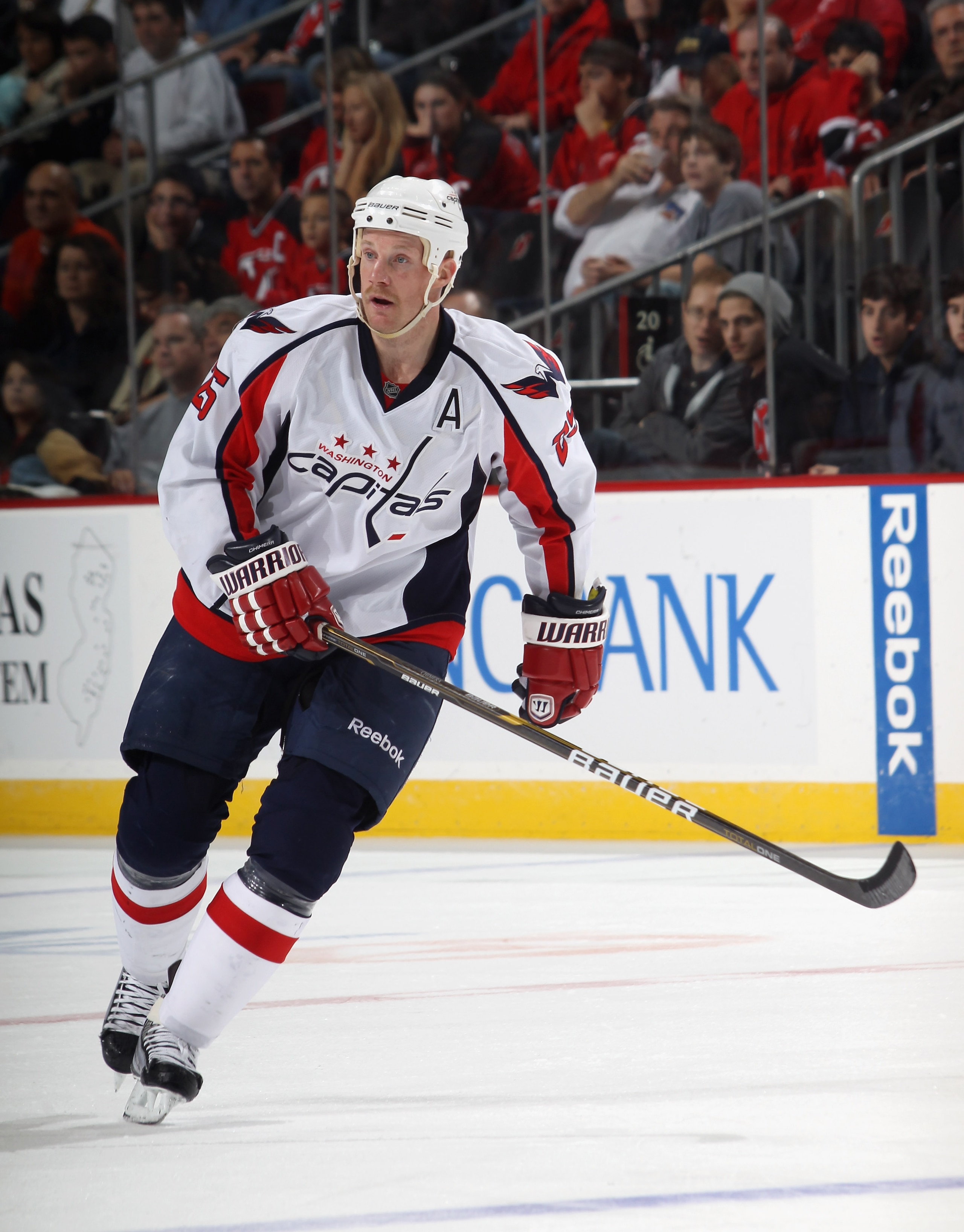 NEWARK, NJ - NOVEMBER 22:  Jason Chimera #25 of the Washington Capitals skates against the New Jersey Devils at the Prudential Center on November 22, 2010 in Newark, New Jersey. The Devils defeated the Capitals 5-0.  (Photo by Bruce Bennett/Getty Images)