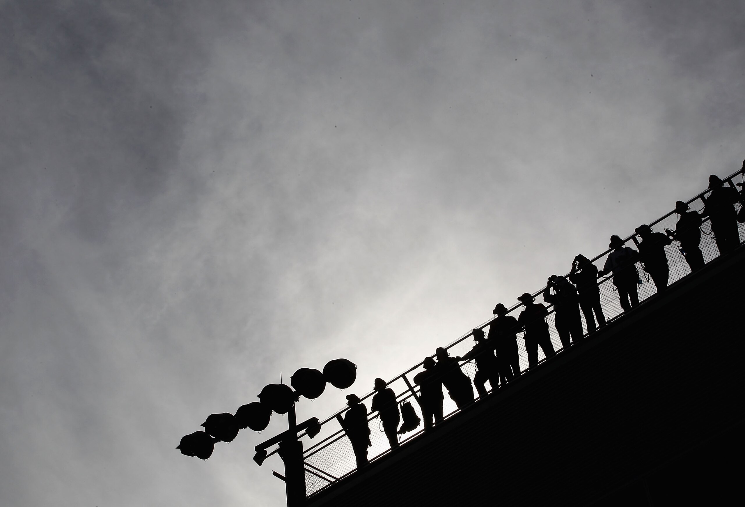 AVONDALE, AZ - NOVEMBER 14:  Team spotters watch race action during the NASCAR Sprint Cup Series Kobalt Tools 500 at Phoenix International Raceway on November 14, 2010 in Avondale, Arizona.  (Photo by Christian Petersen/Getty Images for NASCAR)