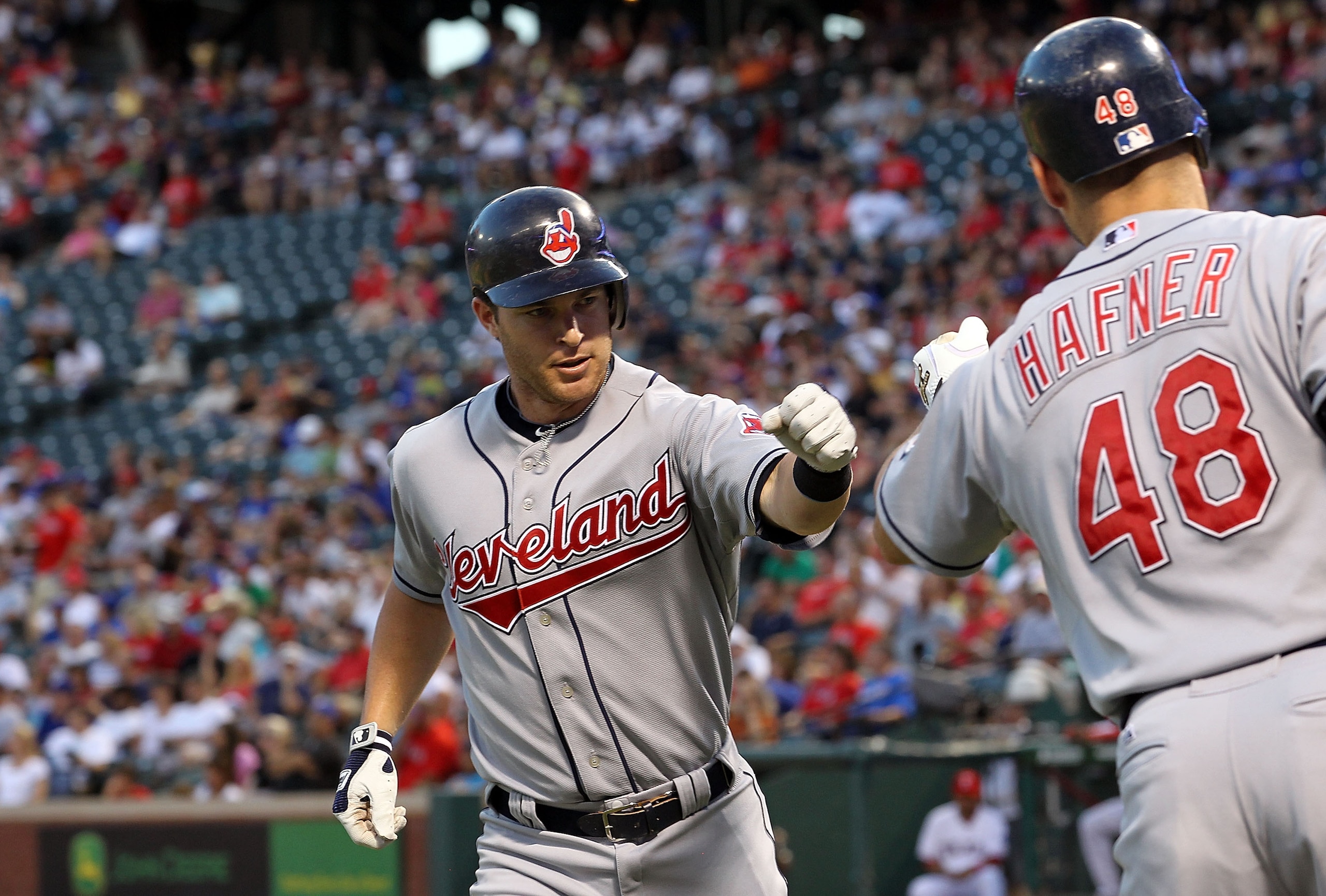 ARLINGTON, TX - JULY 05: Jayson Nix #12 of the Cleveland Indians celebrates his solo homerun with Travis Hafner #48 against the Texas Rangers on July 5, 2010 at Rangers Ballpark in Arlington, Texas. (Photo by Ronald Martinez/Getty Images) ARLINGTON, TX - JULY 05: Jayson Nix #12 of the Cleveland Indians celebrates his solo homerun with Travis Hafner #48 against the Texas Rangers on July 5, 2010 at Rangers Ballpark in Arlington, Texas. (Photo by Ronald Martinez/Getty Images)