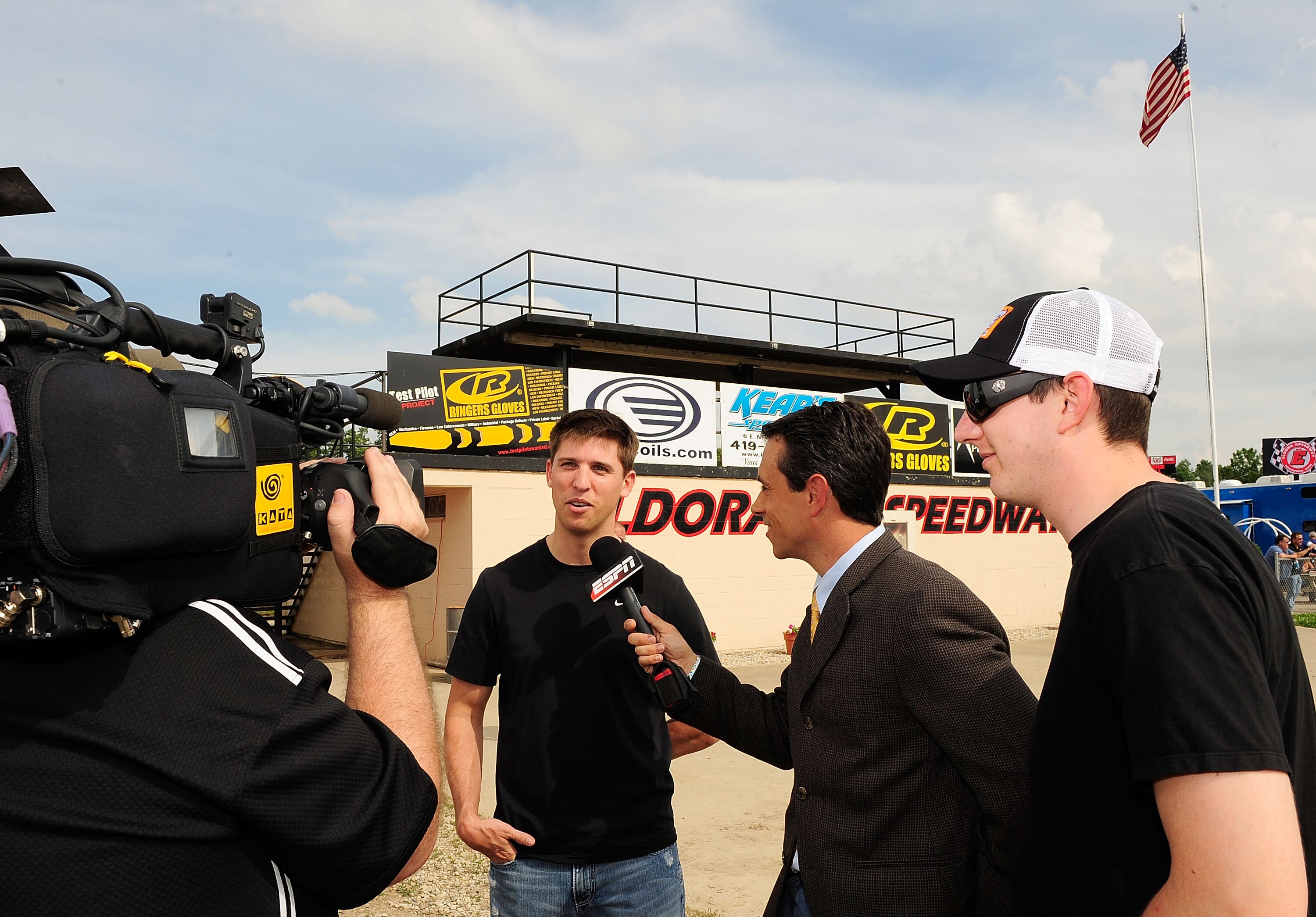 ROSSBURG, OH - JUNE 09: Denny Hamlin, driver of the #11 FedEx late model Toyota and Kyle Busch, driver of the #18 NOS Energy late model Toyota, do an interview prior to the Gillette Fusion ProGlide Prelude to the Dream at Eldora Speedway on June 9, 2010 i