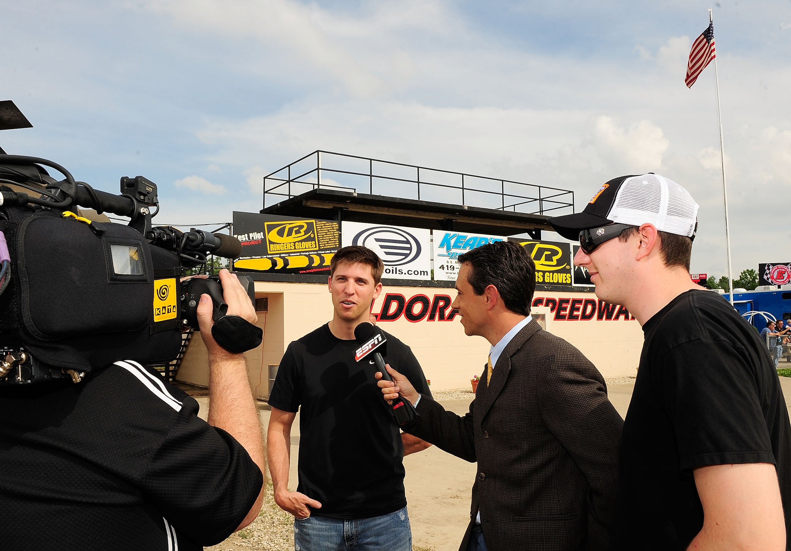 ROSSBURG, OH - JUNE 09: Denny Hamlin, driver of the #11 FedEx late model Toyota and Kyle Busch, driver of the #18 NOS Energy late model Toyota, do an interview prior to the Gillette Fusion ProGlide Prelude to the Dream at Eldora Speedway on June 9, 2010 i