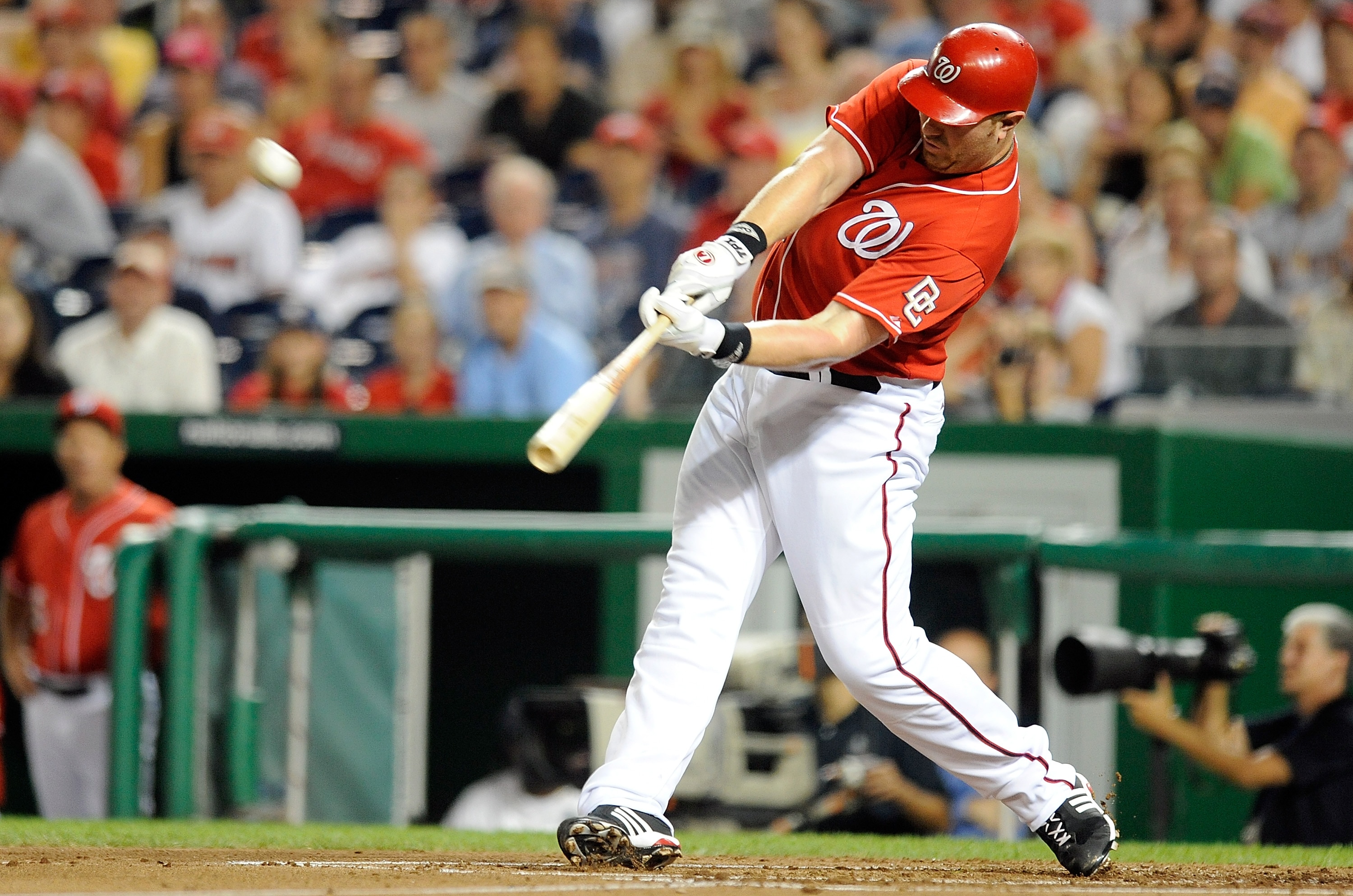 WASHINGTON - SEPTEMBER 24: Adam Dunn #44 of the Washington Nationals hits a home run in the second inning against the Atlanta Braves at Nationals Park on September 24, 2010 in Washington, DC. (Photo by Greg Fiume/Getty Images)