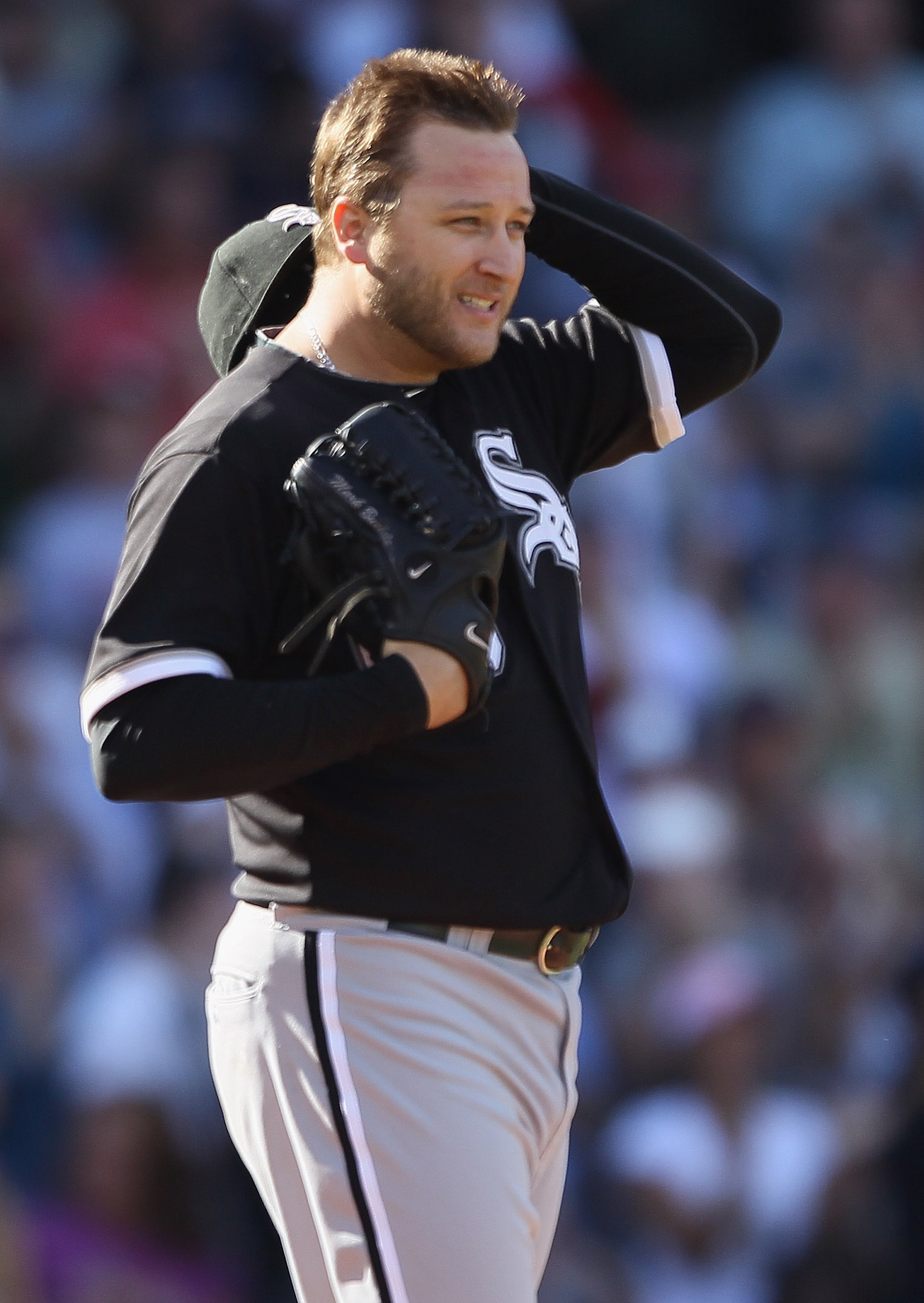 BOSTON - SEPTEMBER 05:  Mark Buehrle #56 of the Chicago White Sox reacts after giving up a two run homer to Victor Martinez of the Boston Red Sox in the seventh inning on September 5, 2010 at Fenway Park in Boston, Massachusetts.  (Photo by Elsa/Getty Ima