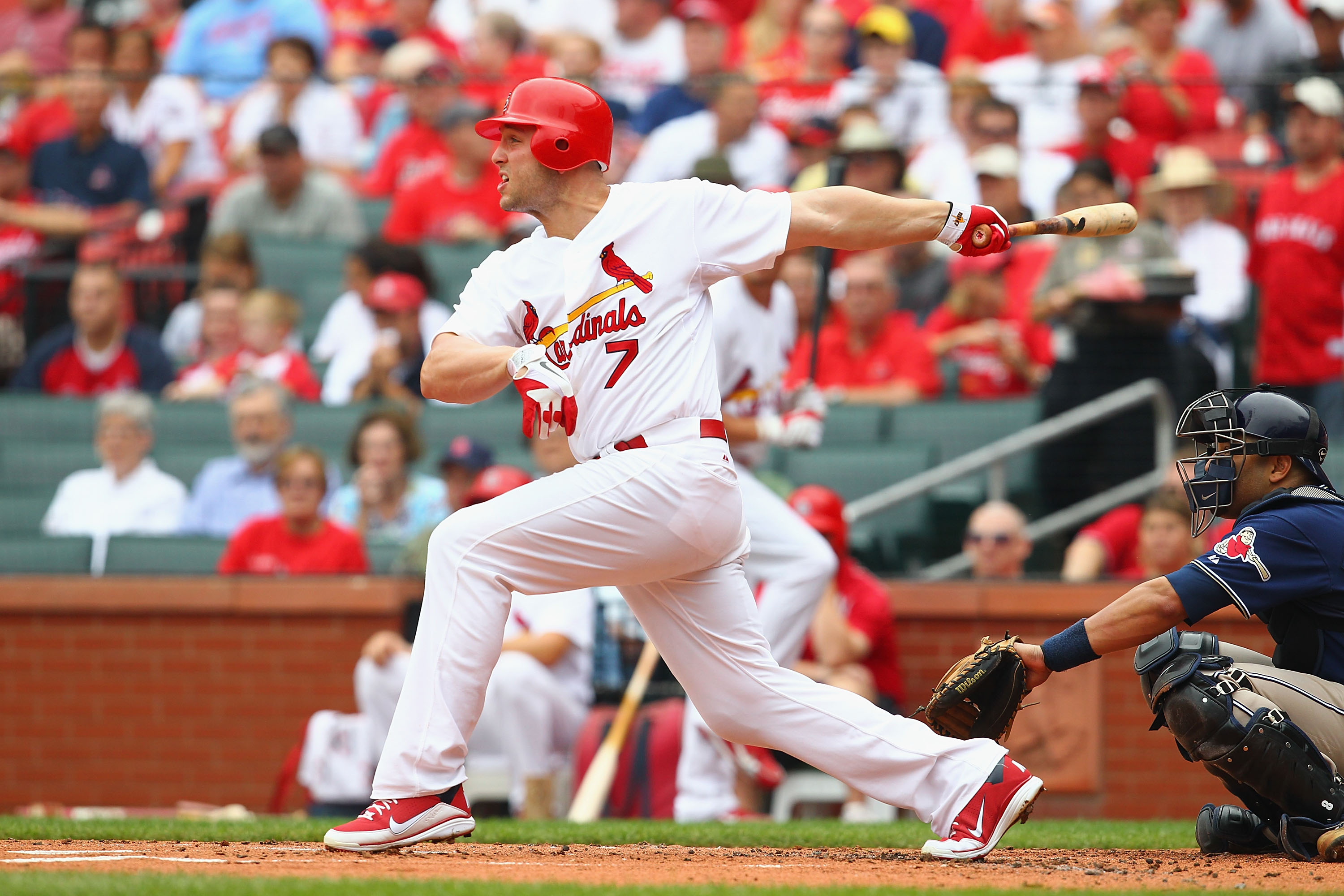 ST. LOUIS - SEPTEMBER 19: Matt Holliday #7 of the St. Louis Cardinals hits an RBI single against the San Diego Padres at Busch Stadium on September 19, 2010 in St. Louis, Missouri.  The Cardinals beat the Padres 4-1.  (Photo by Dilip Vishwanat/Getty Image
