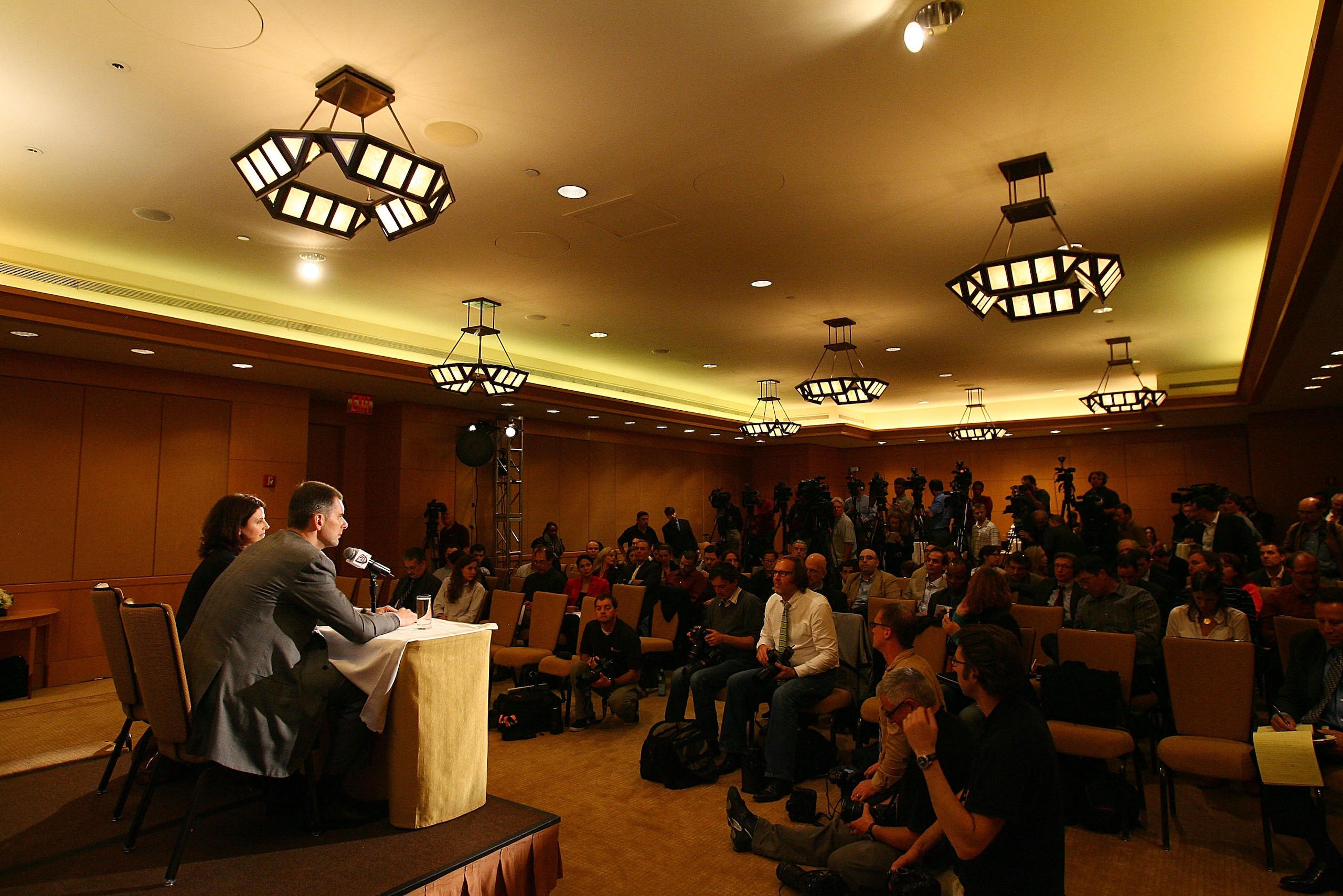 NEW YORK - MAY 19:  New Jersey Nets Owner Mikhail Prokhorov and Communication Director Ellen Pinchuk address the media during a press conference at the Four Seasons Hotel on May 19, 2010 in New York City.  (Photo by Mike Stobe/Getty Images)