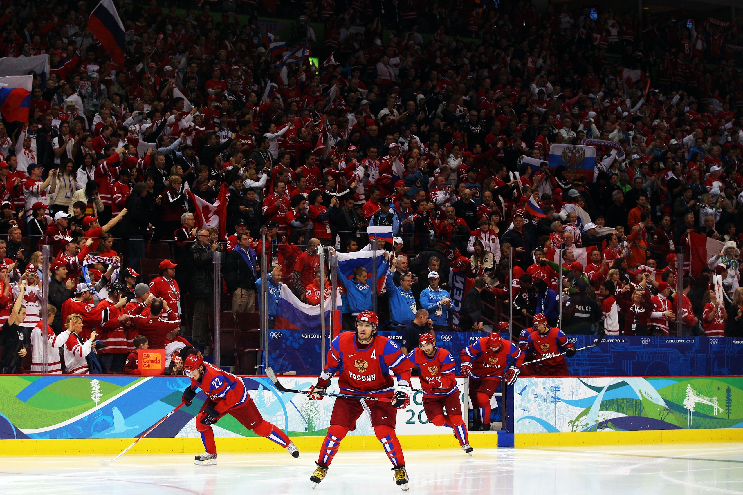 VANCOUVER, BC - FEBRUARY 24:  Alexander Ovechkin #8 of Russia leads the team out on the ice before taking on Canada during the ice hockey men's quarter final game between Russia and Canada on day 13 of the Vancouver 2010 Winter Olympics at Canada Hockey P