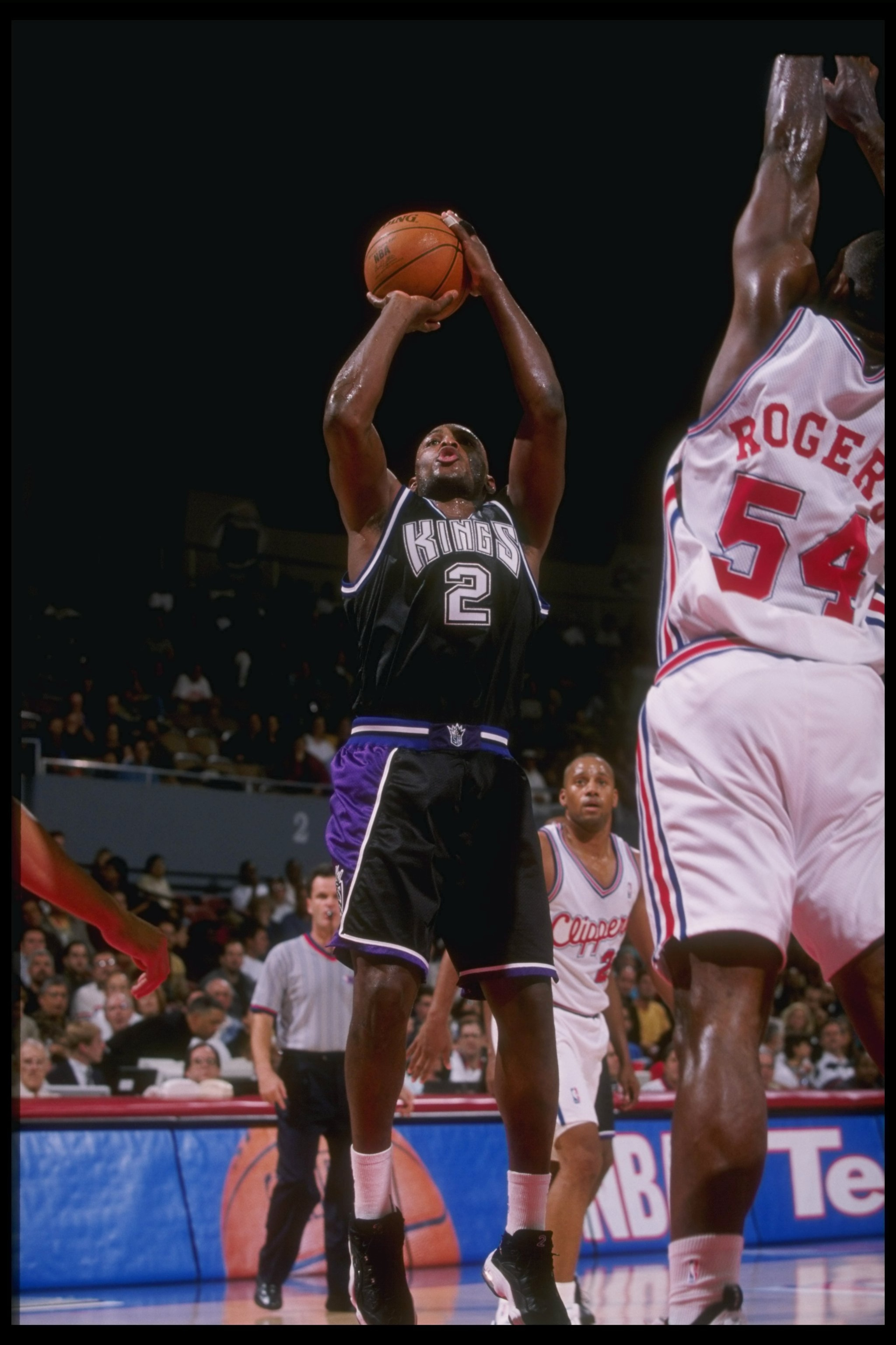 26 Nov 1997: Guard Mitch Richmond of the Sacramento Kings shoots the ball over forward Rodney Rodgers of the Los Angeles Clippers during a game at the Los Angeles Sports Arena in Los Angeles, California. The Clippers won the game 99-97. 26 Nov 1997: Guard Mitch Richmond of the Sacramento Kings shoots the ball over forward Rodney Rodgers of the Los Angeles Clippers during a game at the Los Angeles Sports Arena in Los Angeles, California. The Clippers won the game 99-97.