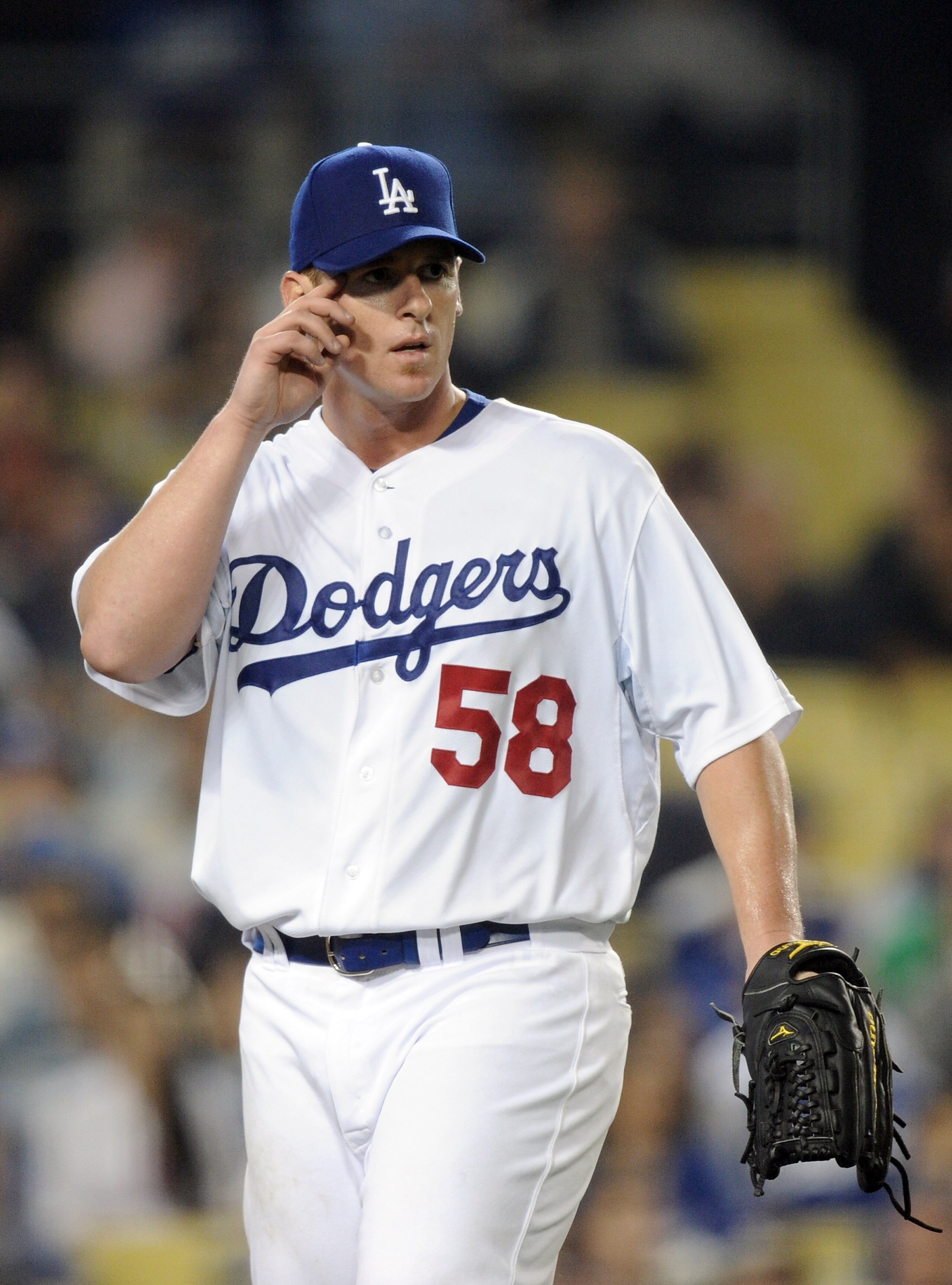LOS ANGELES, CA - SEPTEMBER 21:  Chad Billingsley #55 of the Los Angeles Dodgers reacts after an RBI single by Chase Headley #7 of the San Diego Padres to score the third run of the inning and a 5-0 lead over the Los Angeles Dodgers during the fifth innin