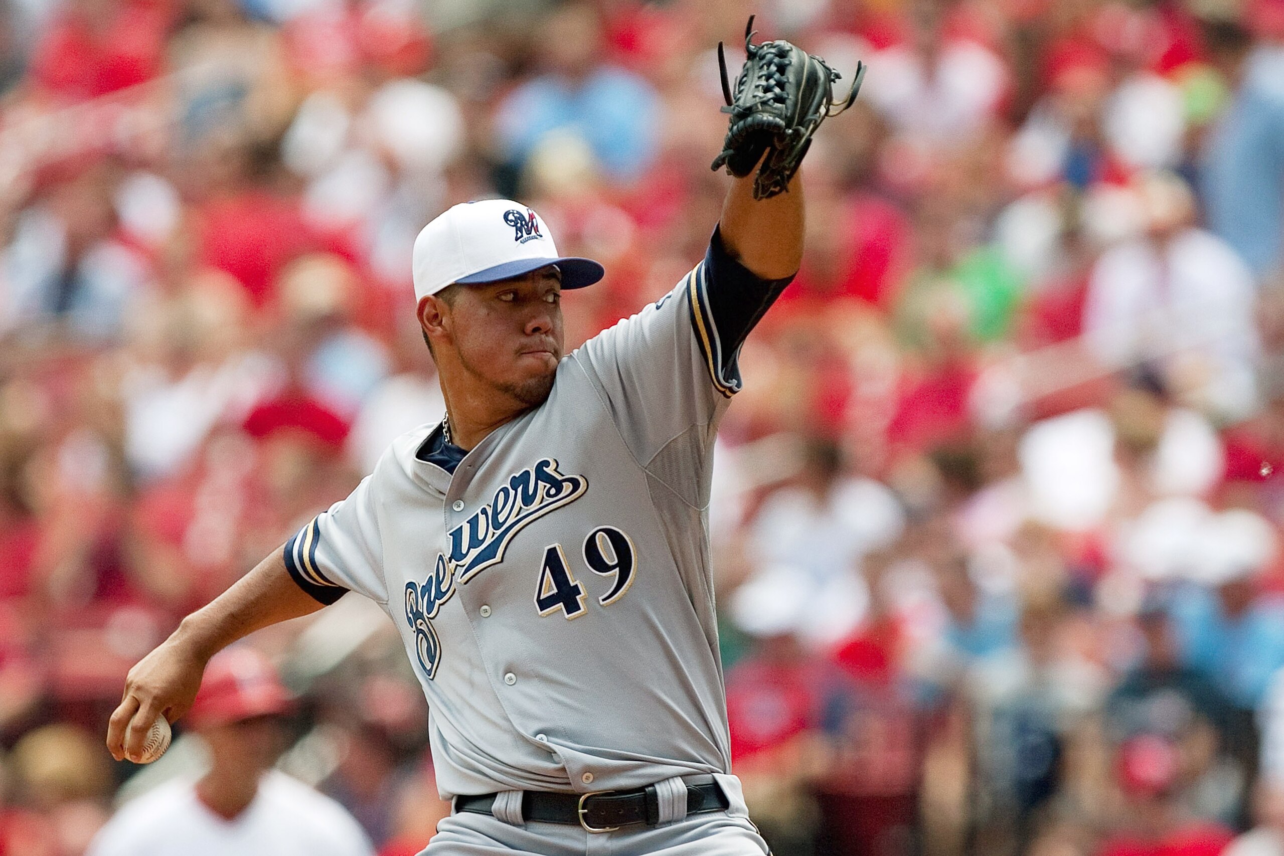ST. LOUIS - JULY 4: Starting pitcher Yovani Gallardo #49 of the Milwaukee Brewers throws against the St. Louis Cardinals at Busch Stadium on July 4, 2010 in St. Louis, Missouri.  The Cardinals beat the Brewers 7-1.  (Photo by Dilip Vishwanat/Getty Images)