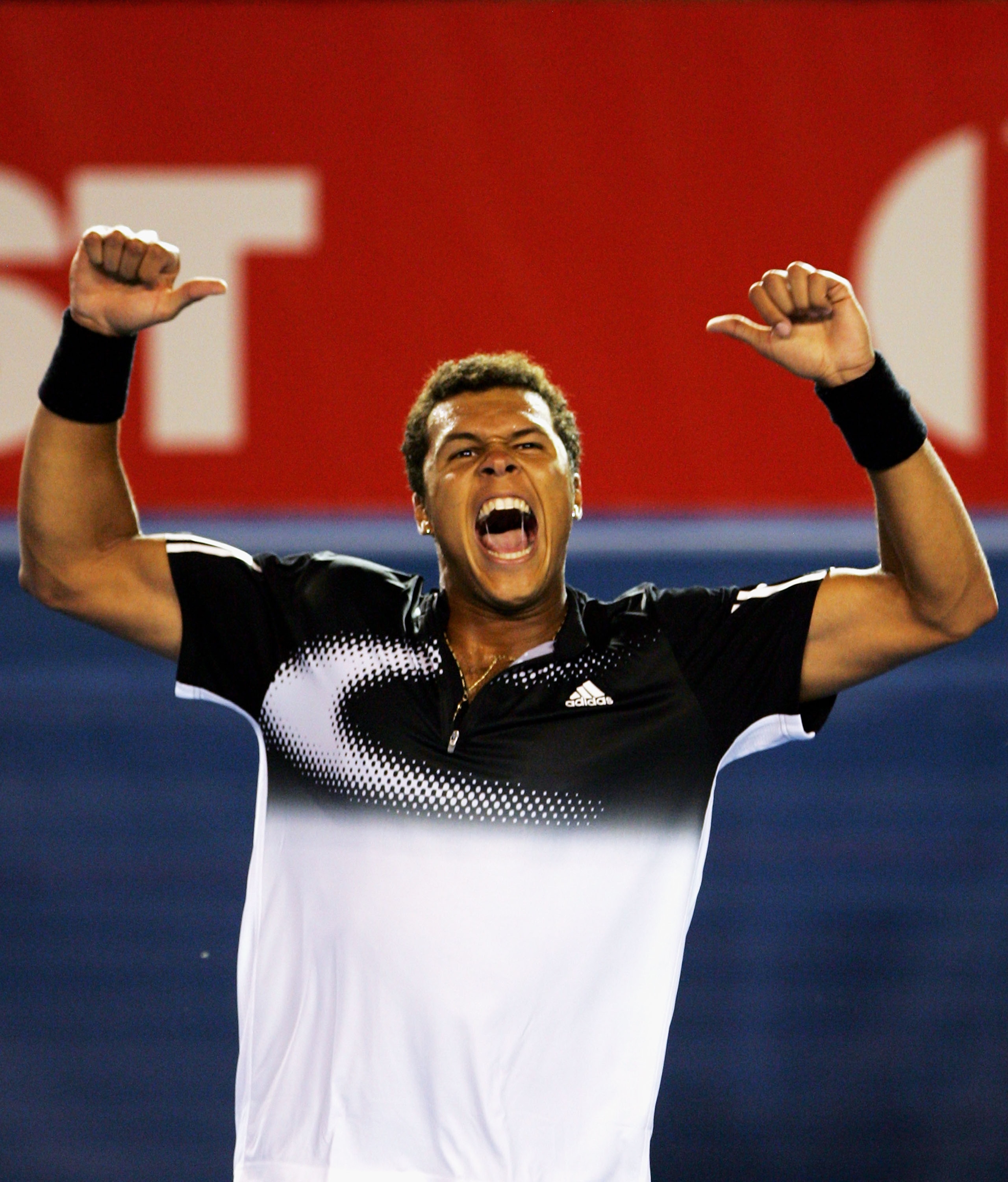 MELBOURNE, AUSTRALIA - JANUARY 24:  Jo-Wilfried Tsonga of France celebrates victory after his semi-final match against Rafael Nadal of Spain on day eleven of the Australian Open 2008 at Melbourne Park on January 24, 2008 in Melbourne, Australia.  (Photo b