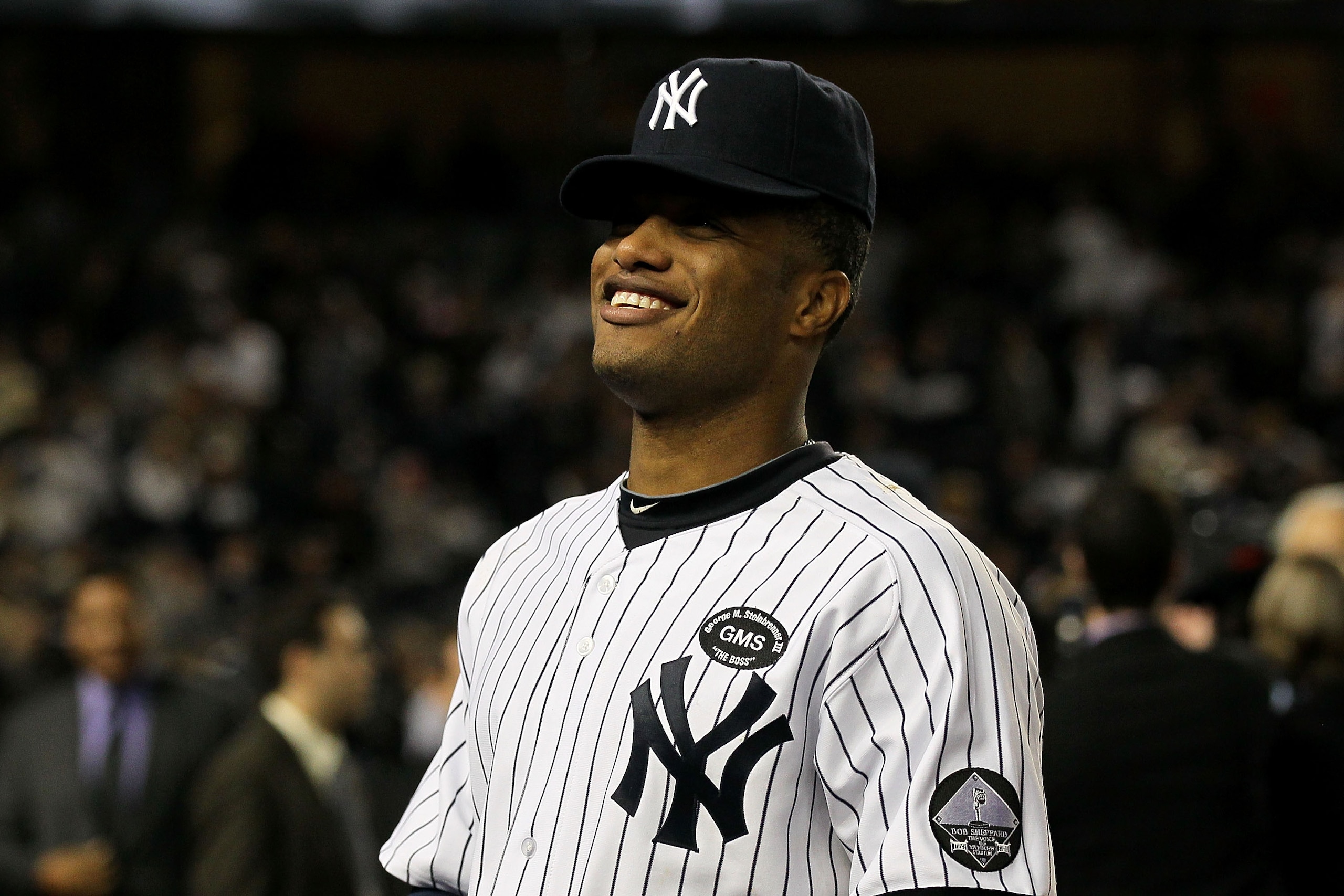 NEW YORK - OCTOBER 09: Robinson Cano #24 of the New York Yankees celebrates afte the Yankees 6-1 win against the Minnesota Twins during Game Three of the ALDS part of the 2010 MLB Playoffs at Yankee Stadium on October 9, 2010 in the Bronx borough of New NEW YORK - OCTOBER 09: Robinson Cano #24 of the New York Yankees celebrates afte the Yankees 6-1 win against the Minnesota Twins during Game Three of the ALDS part of the 2010 MLB Playoffs at Yankee Stadium on October 9, 2010 in the Bronx borough of New