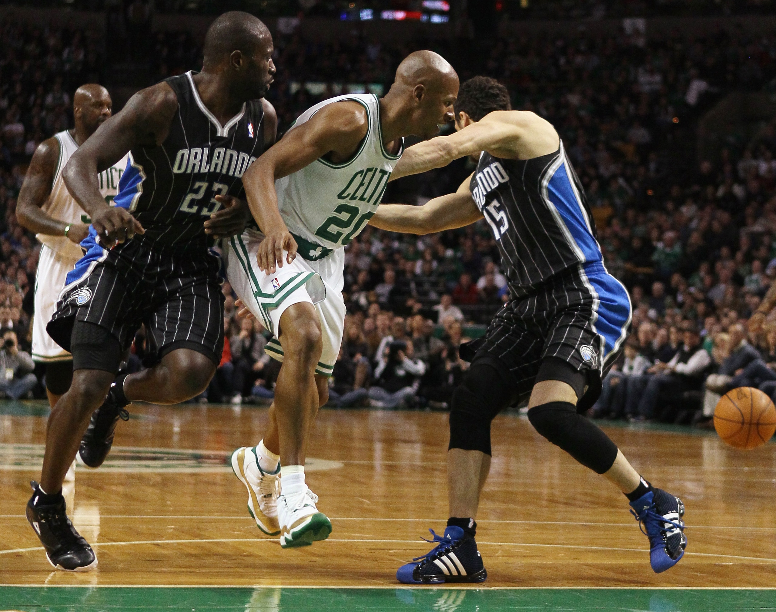 BOSTON, MA - JANUARY 17: Jason Richardson #23 and Hedo Turkoglu #15 of the Orlando Magic steal the ball from Ray Allen #20 of the Boston Celtics on January 17, 2011 at the TD Garden in Boston, Massachusetts. NOTE TO USER: User expressly acknowledges an BOSTON, MA - JANUARY 17: Jason Richardson #23 and Hedo Turkoglu #15 of the Orlando Magic steal the ball from Ray Allen #20 of the Boston Celtics on January 17, 2011 at the TD Garden in Boston, Massachusetts. NOTE TO USER: User expressly acknowledges an