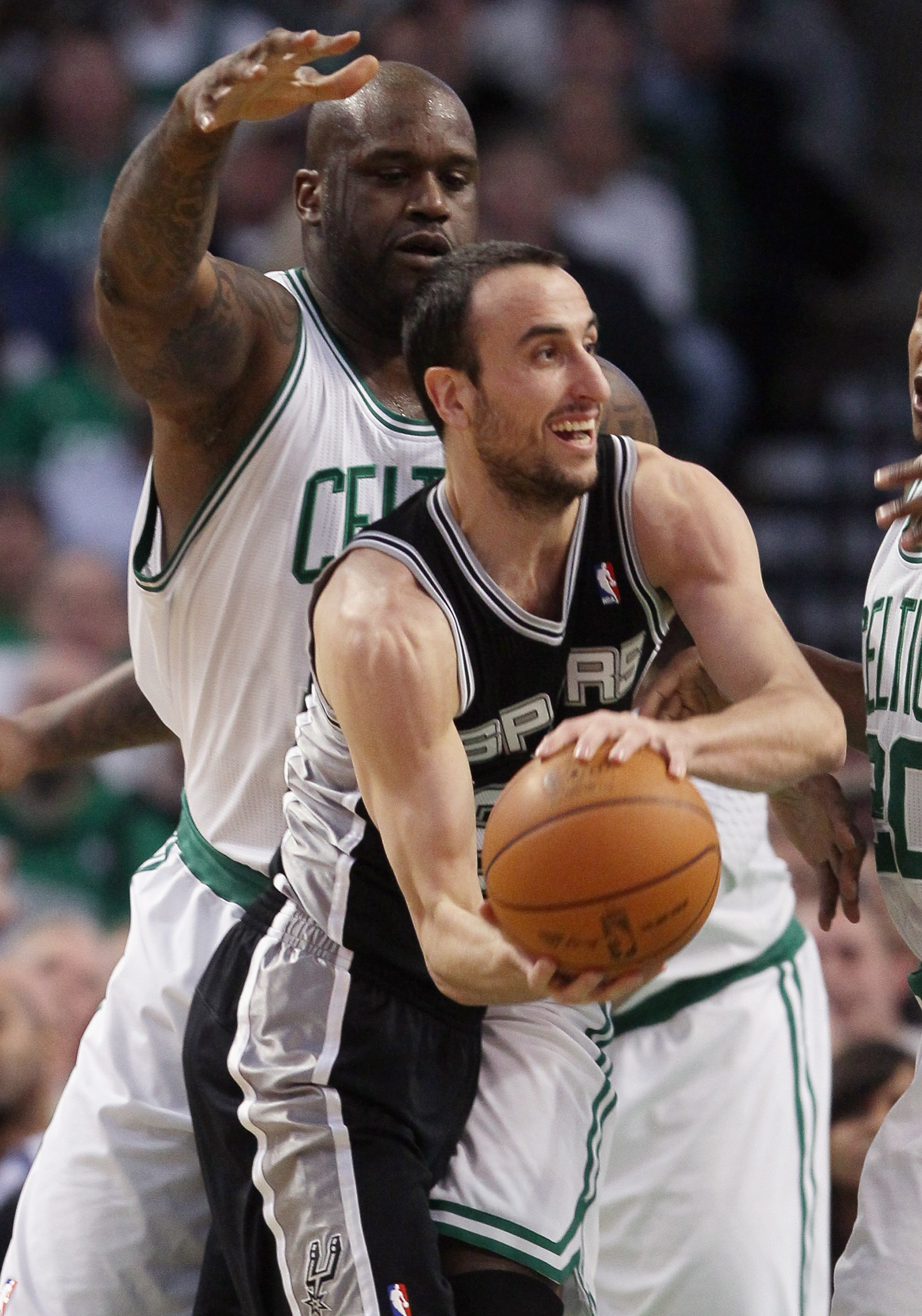 BOSTON, MA - JANUARY 05: Manu Ginobili #20 of the San Antonio Spurs tries to pass as Shaquille O'Neal #36 of the Boston Celtics defends on January 5, 2011 at the TD Garden in Boston, Massachusetts. NOTE TO USER: User expressly acknowledges and agrees tha BOSTON, MA - JANUARY 05: Manu Ginobili #20 of the San Antonio Spurs tries to pass as Shaquille O'Neal #36 of the Boston Celtics defends on January 5, 2011 at the TD Garden in Boston, Massachusetts. NOTE TO USER: User expressly acknowledges and agrees tha