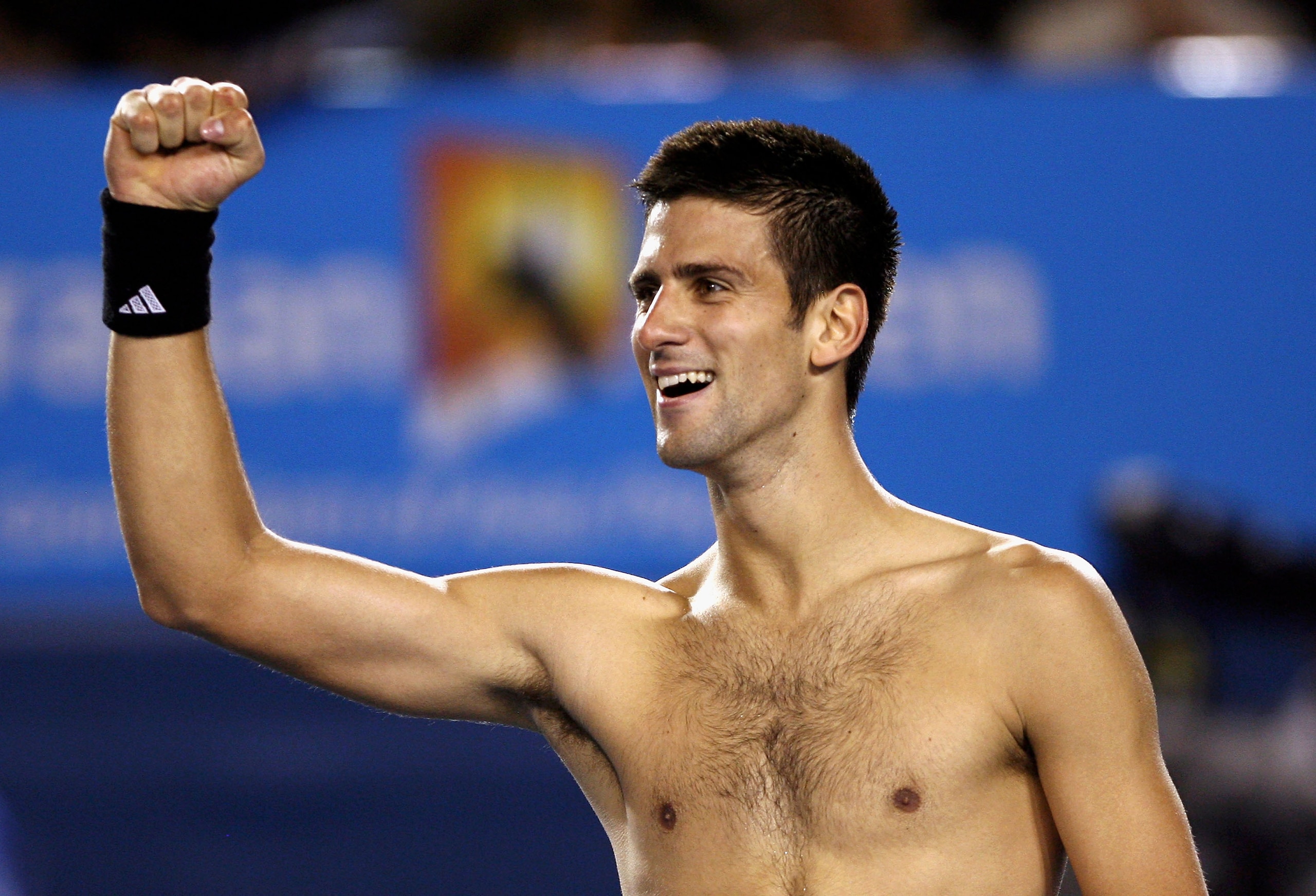 MELBOURNE, AUSTRALIA - JANUARY 25:  Novak Djokovic of Serbia celebrates winning his semi-final match against Roger Federer of Switzerland on day twelve of the Australian Open 2008 at Melbourne Park on January 25, 2008 in Melbourne, Australia.  (Photo by C