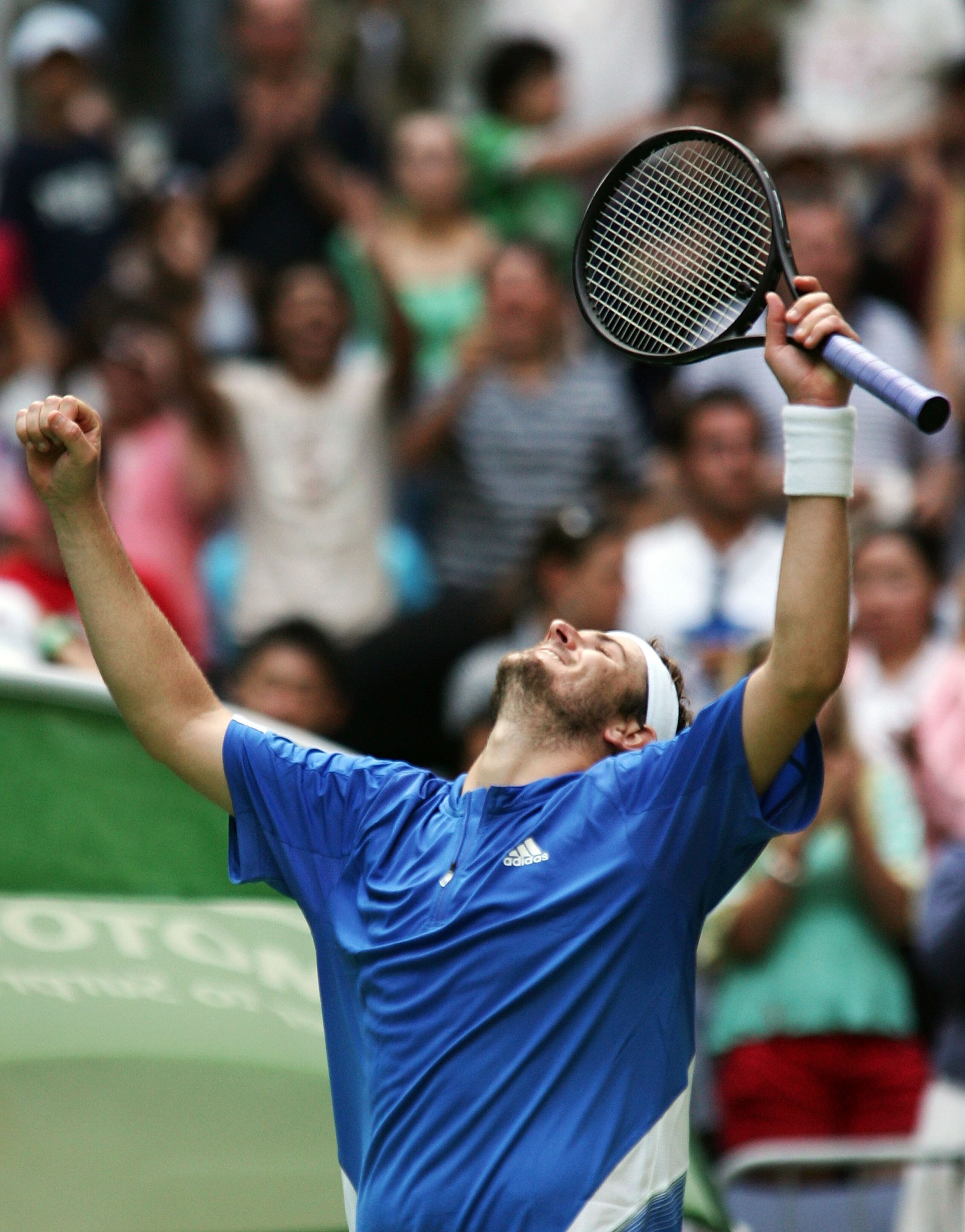 MELBOURNE, AUSTRALIA - JANUARY 15:  Mardy Fish of the USA celebrates winning his first round match against Ivan Ljubicic of Croatiaon day one of the Australian Open 2007 at Melbourne Park on January 15, 2007 in Melbourne, Australia.  (Photo by Adam Pretty