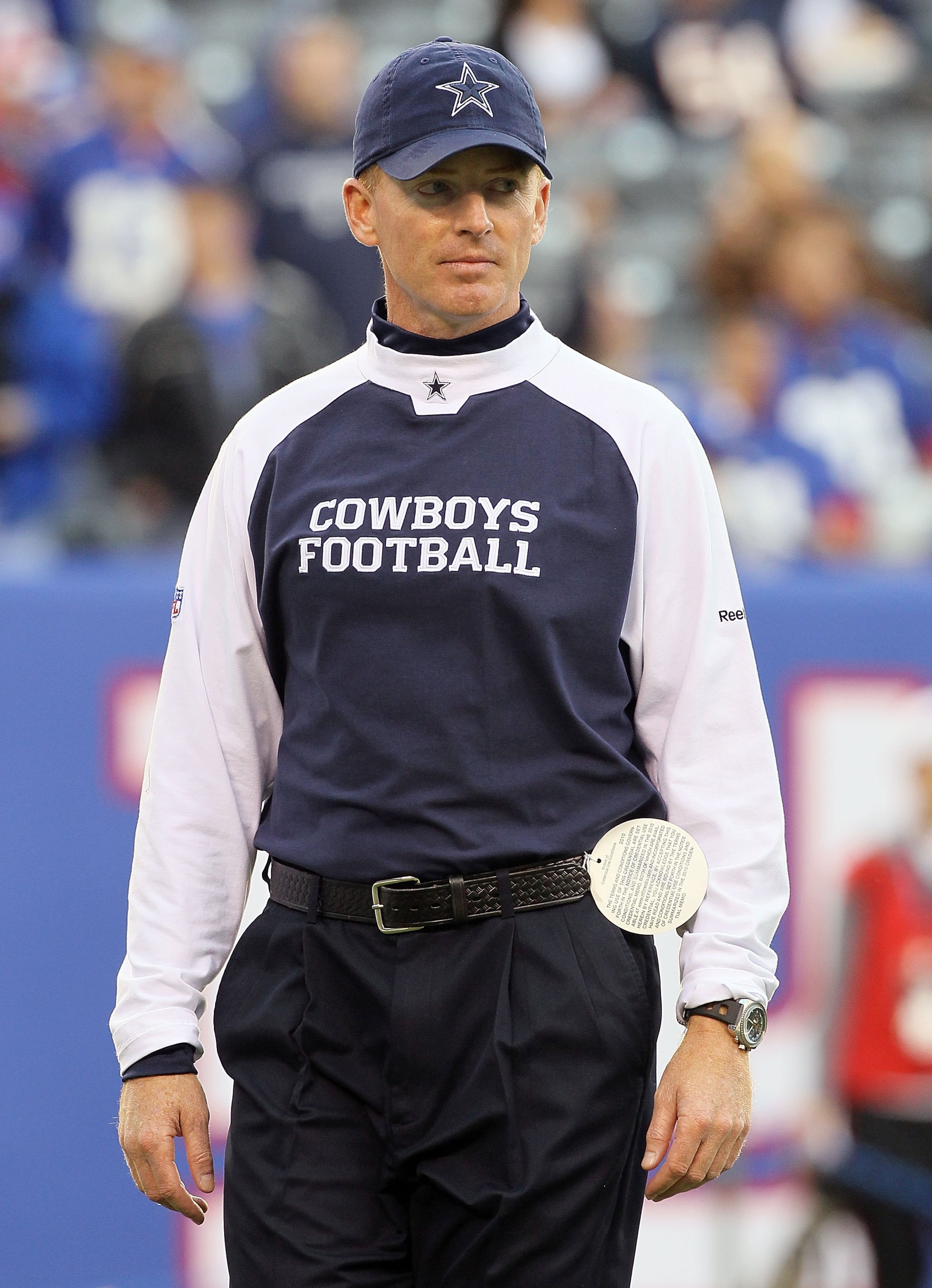 EAST RUTHERFORD, NJ - NOVEMBER 14:  Head coach Jason Garrett of the Dallas Cowboys looks on as his team warms up prior to playing against the New York Giants on November 14, 2010 at the New Meadowlands Stadium in East Rutherford, New Jersey.  (Photo by Ji