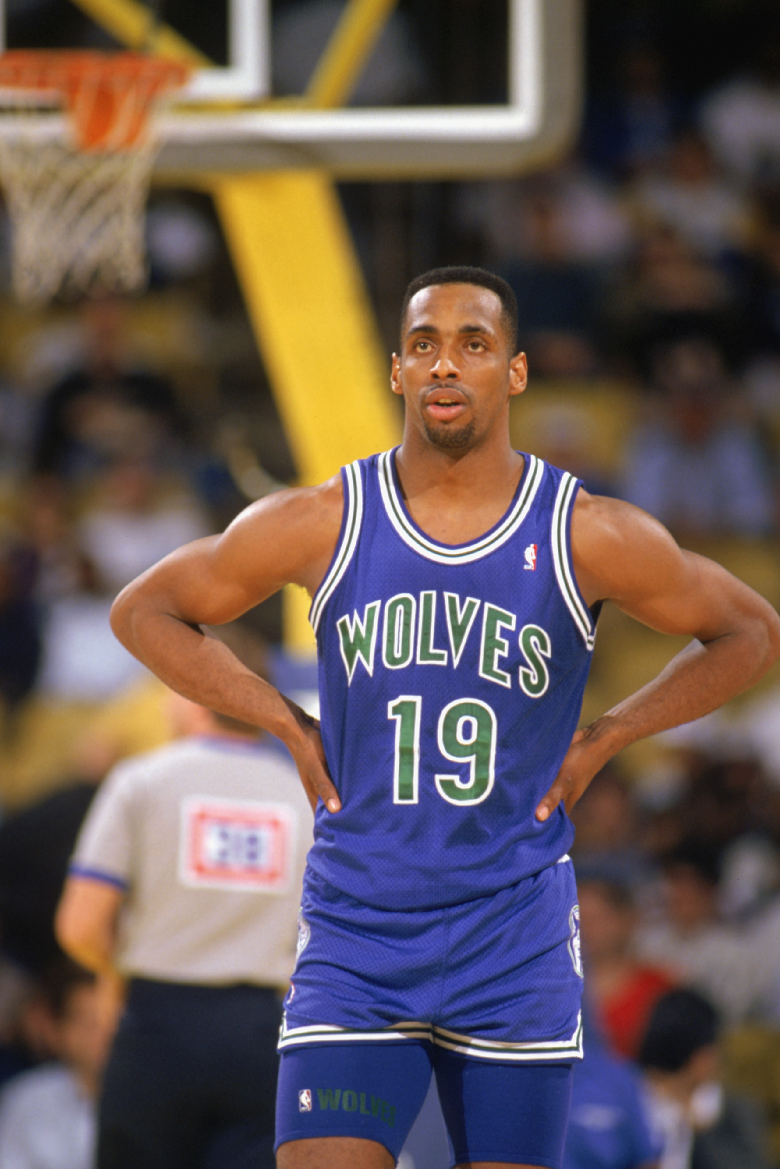 LOS ANGELES - 1990:  Tony Campbell #19 of the Minnesota Timberwolves looks on in a game against the Los Angeles Lakers at the Great Western Forum in Los Angeles, California, during the 1989-1990 NBA season.  (Photo by Ken Levine/Getty Images)
