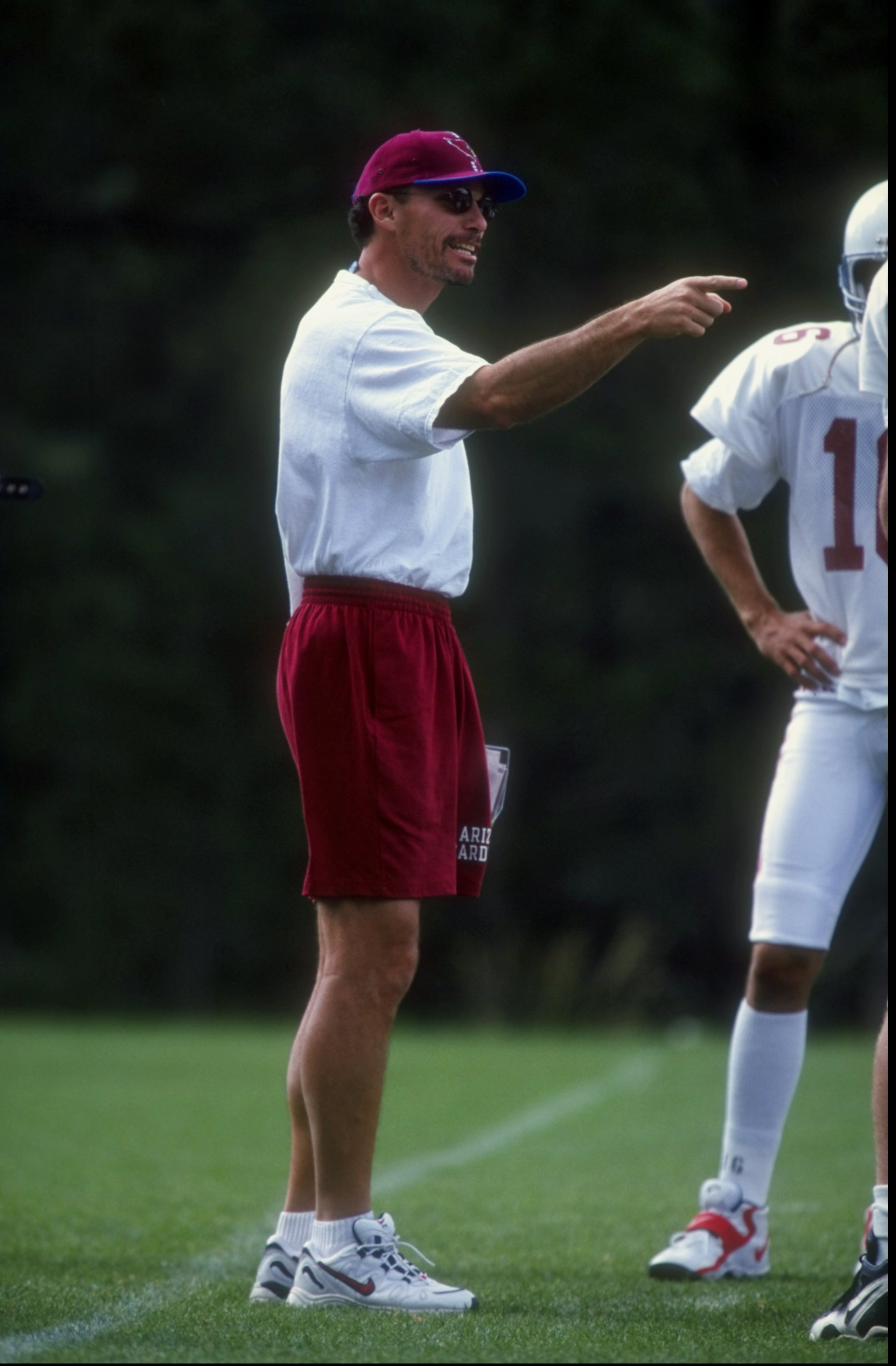 28 Jul 1998:  Offensive coordinator Marc Trestman of the Arizona Cardinals gives instructions to a player during the 1998 Arizona Cardinals training camp at the Northern Arizona University in Flagstaff, Arizona. Mandatory Credit: Marc Piscotty  /Allsport