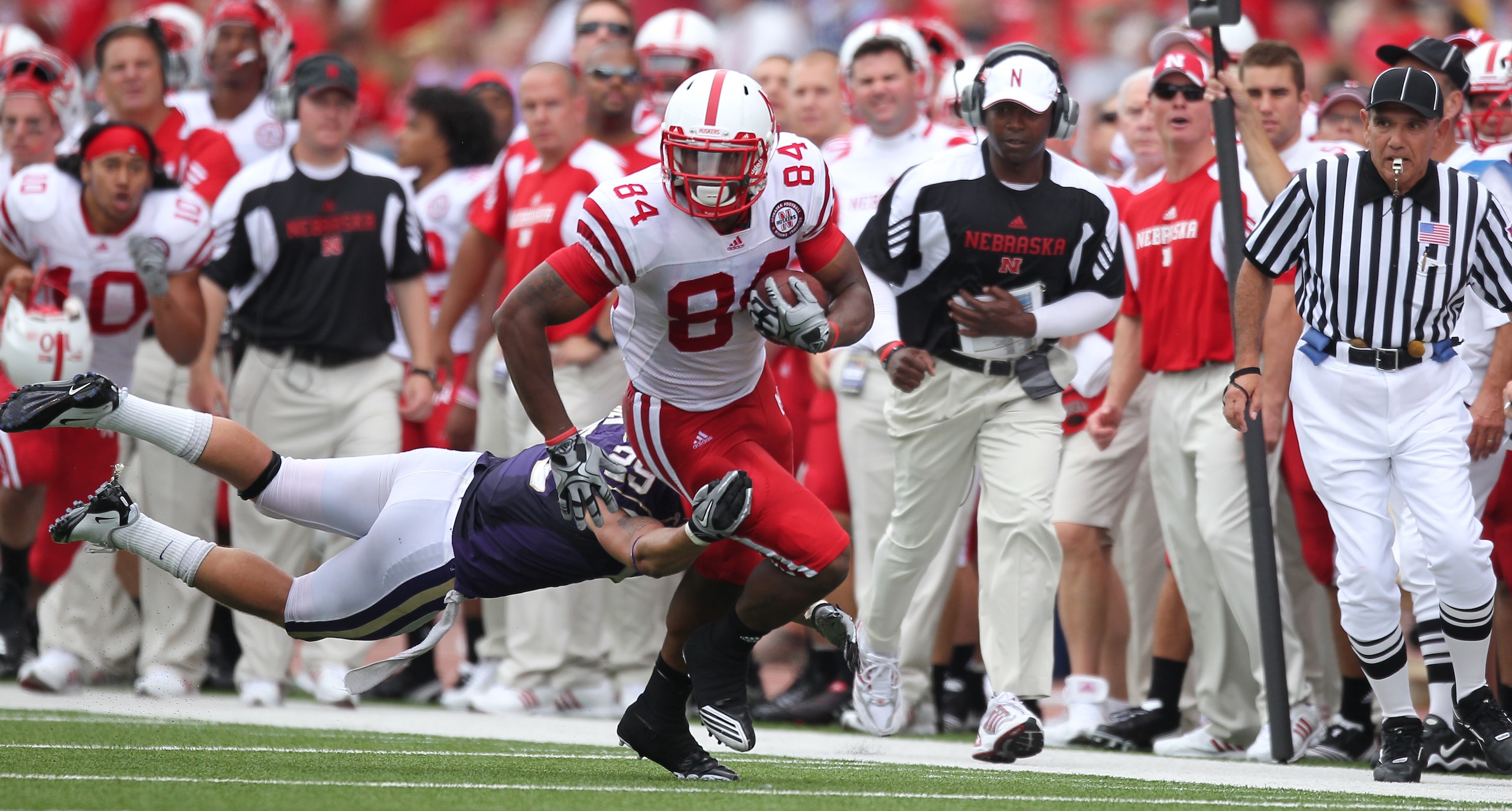 SEATTLE - SEPTEMBER 18: Wide receiver Brandon Kinnie #84 of the Nebraska Cornhuskers rushes against Nate Fellner #29 of the Washington Huskies on September 18, 2010 at Husky Stadium in Seattle, Washington. (Photo by Otto Greule Jr/Getty Images)