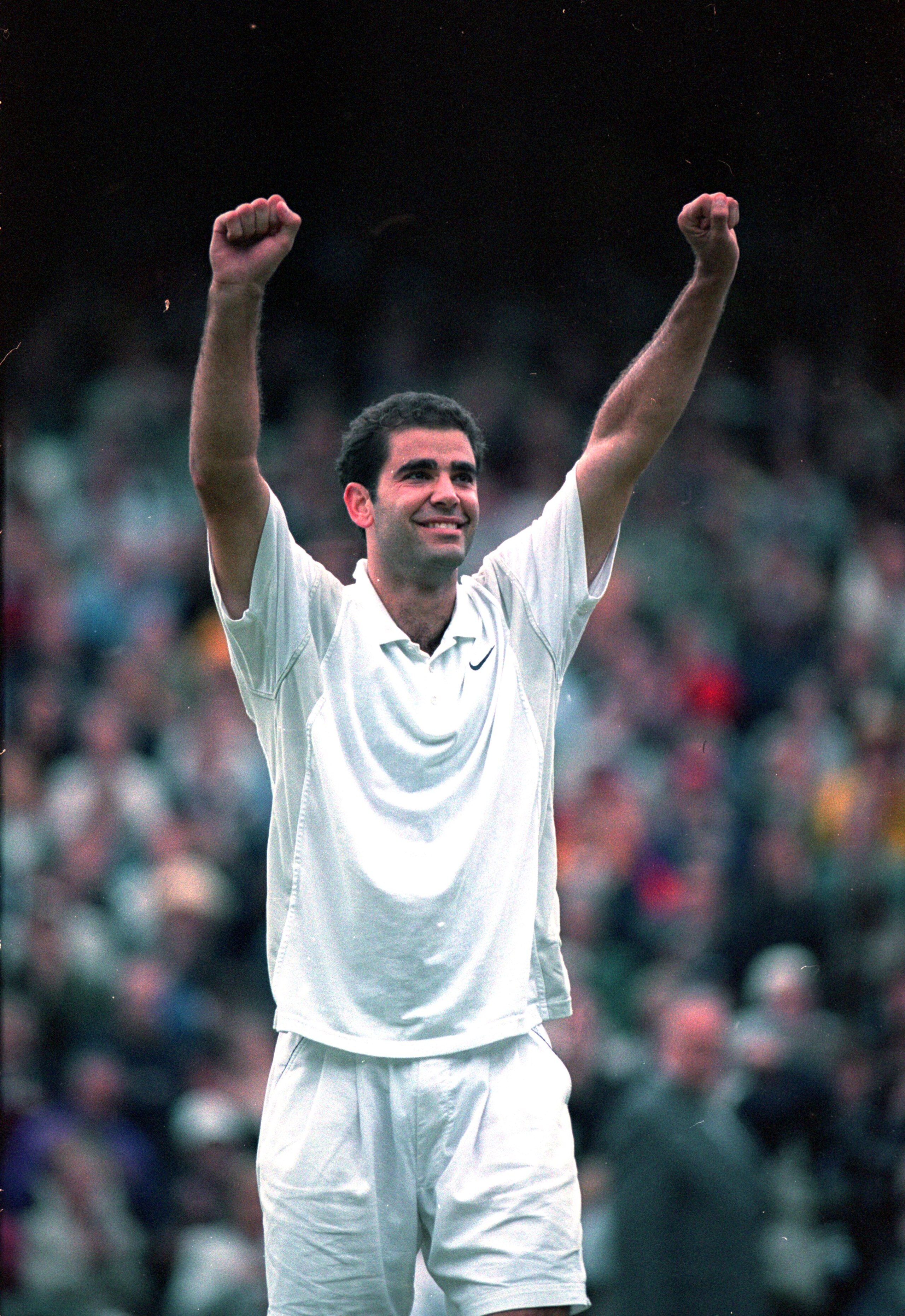 9 Jul 2000:  Pete Sampras of the USA celebrates victory in the mens final against Patrick Rafter of Australia at the Wimbledon Lawn Tennis Championship at the All England Lawn Tennis and Croquet Club, Wimbledon, London. Sampras won in four sets to claima