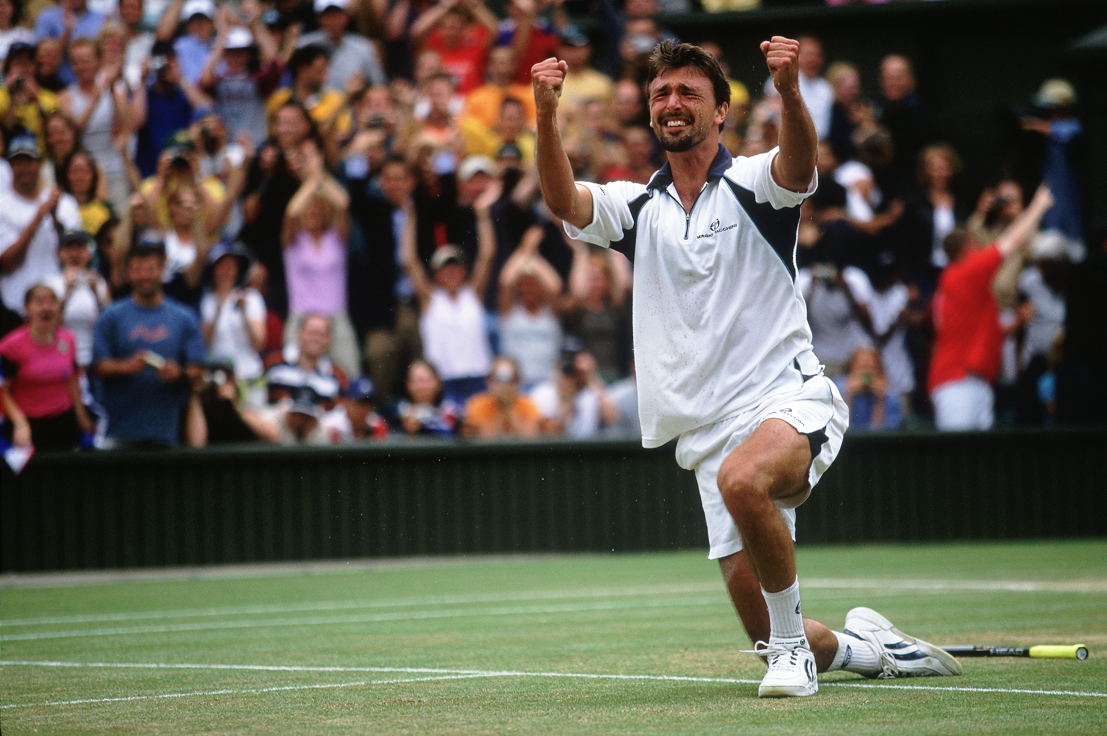 9 Jul 2001: Goran Ivanisevic of Croatia celebrates winning match point during the men's final of the Wimbledon Lawn Tennis Championship held at the All England Lawn Tennis and Croquet Club, in Wimbledon, London. \ Mandatory Credit: Gary M Prior/Allsport 9 Jul 2001: Goran Ivanisevic of Croatia celebrates winning match point during the men's final of the Wimbledon Lawn Tennis Championship held at the All England Lawn Tennis and Croquet Club, in Wimbledon, London. \ Mandatory Credit: Gary M Prior/Allsport