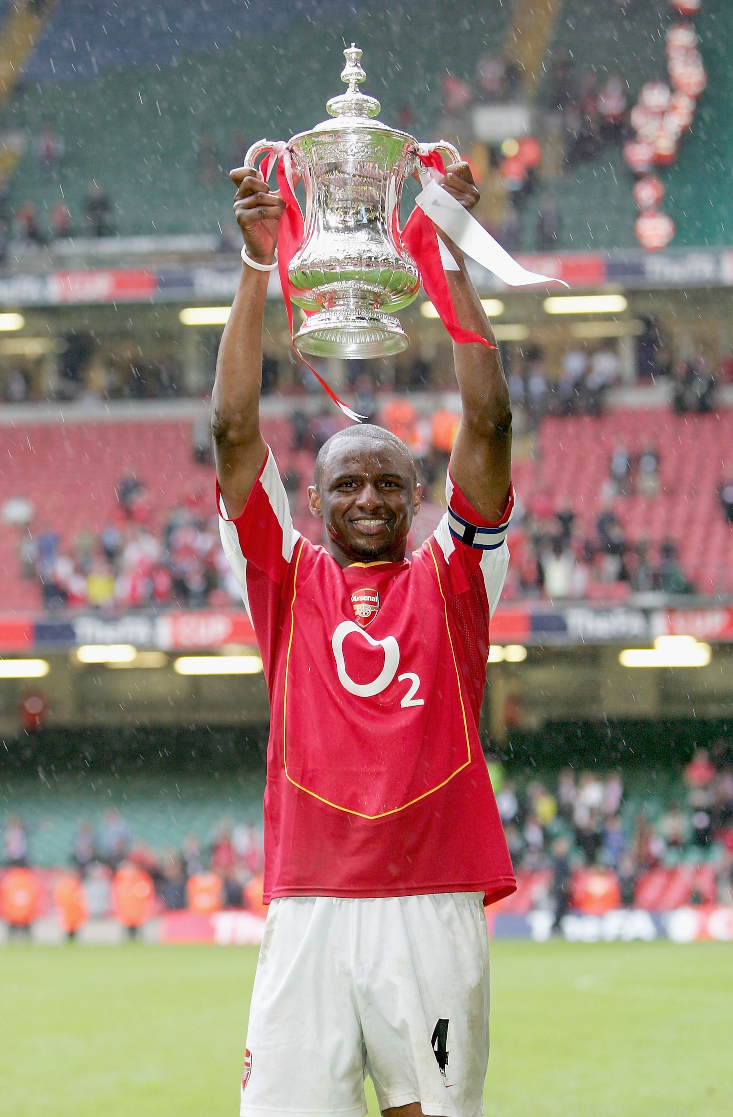 CARDIFF, UNITED KINGDOM - MAY 21:  Captain, Patrick Vieira of Arsenal holds aloft the trophy after winning the FA Cup Final between Arsenal and Manchester United 5-4 on penalty's at The Millennium Stadium on May 21, 2005 in Cardiff, Wales.  (Photo by Ross