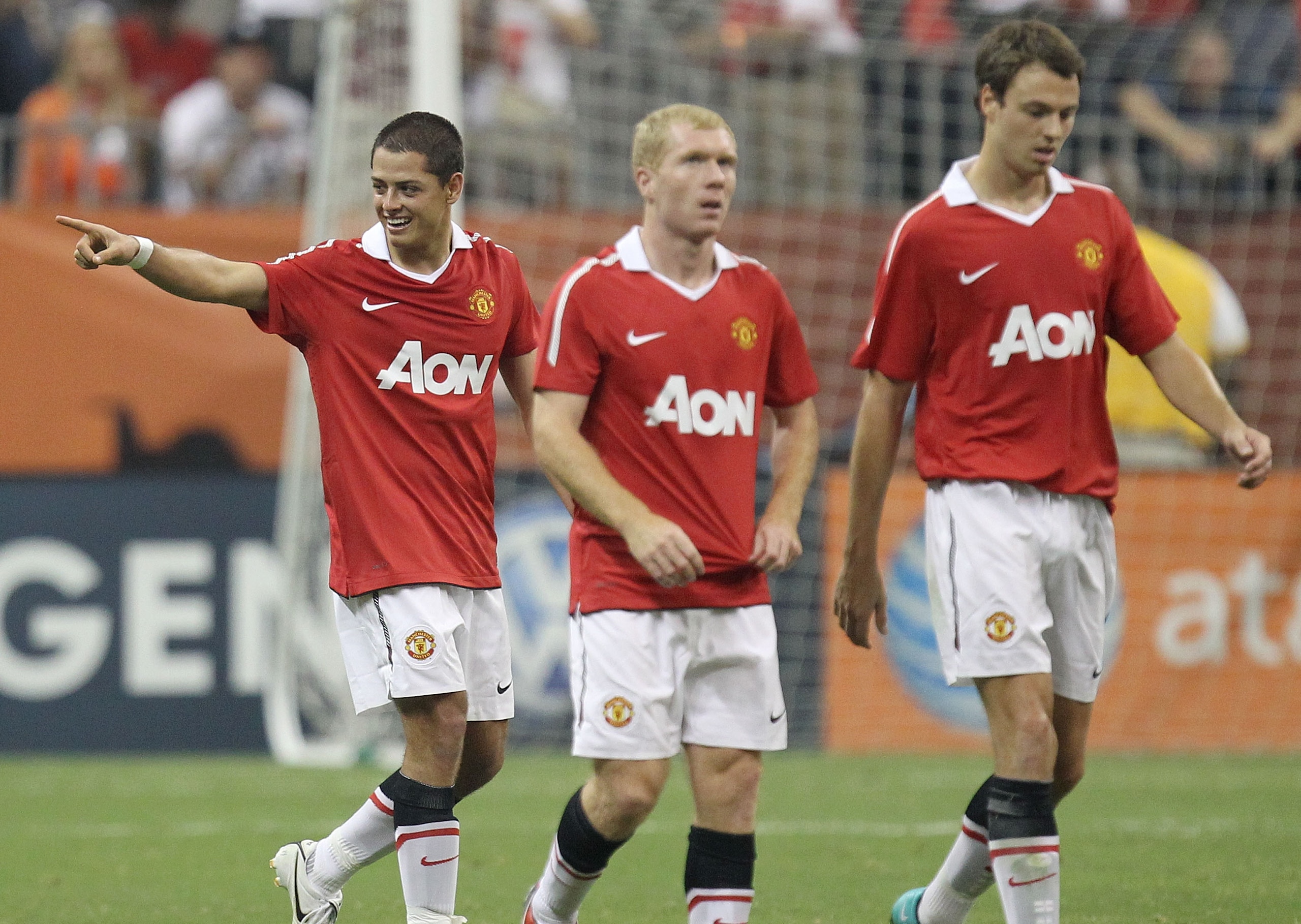 HOUSTON - JULY 28:  Javier Hernandez #14 of Manchester United points towards the bench after scoring in his debut with United against the MLS All-Stars during the MLS All Star Game at Reliant Stadium on July 28, 2010 in Houston, Texas.  (Photo by Ronald M
