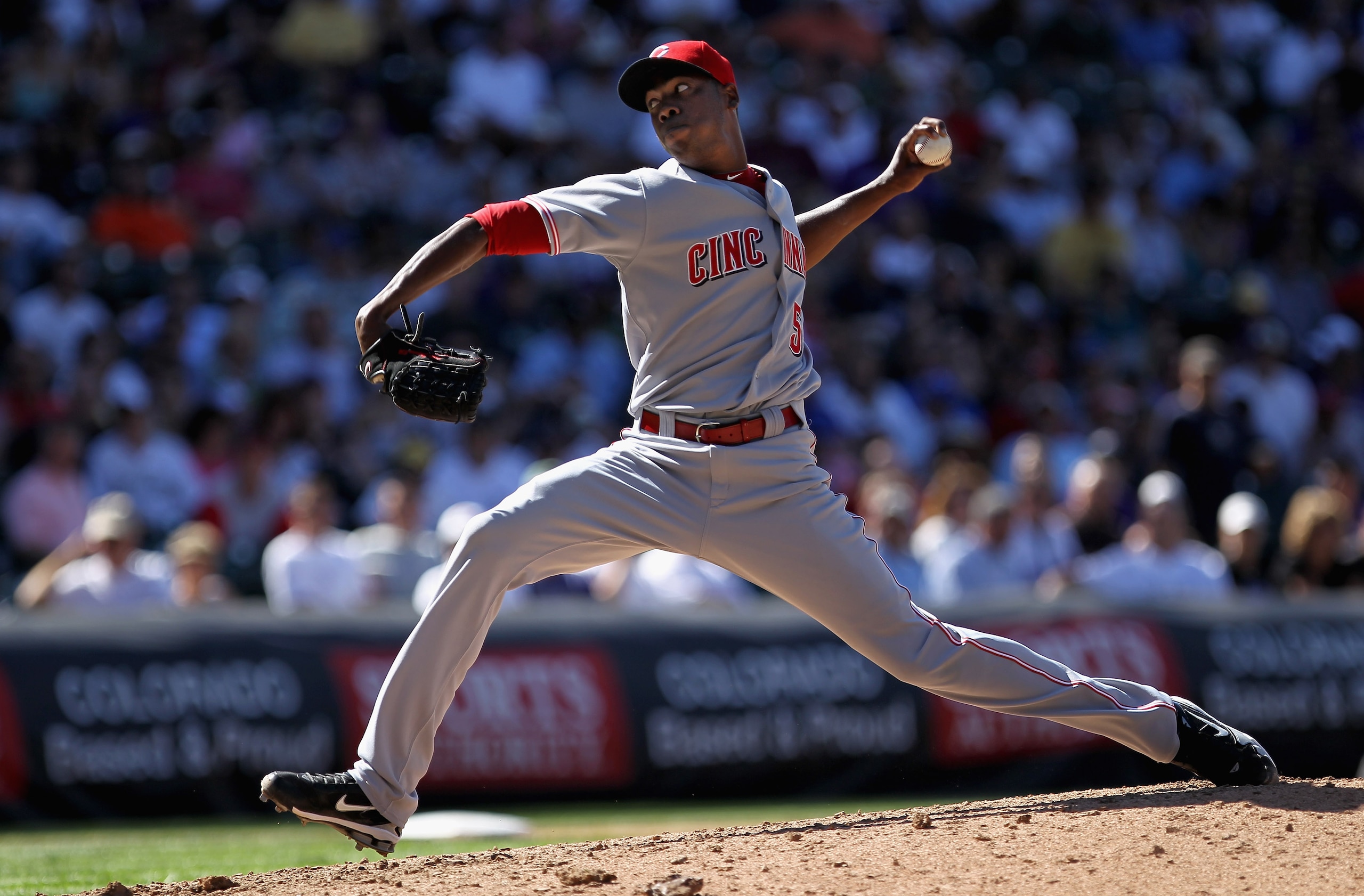 DENVER - SEPTEMBER 09:  Relief pitcher Aroldis Chapman #54 of the Cincinnati Reds delivers against the Colorado Rockies at Coors Field on September 9, 2010 in Denver, Colorado. The Rockies defeated the Reds 6-5.  (Photo by Doug Pensinger/Getty Images)