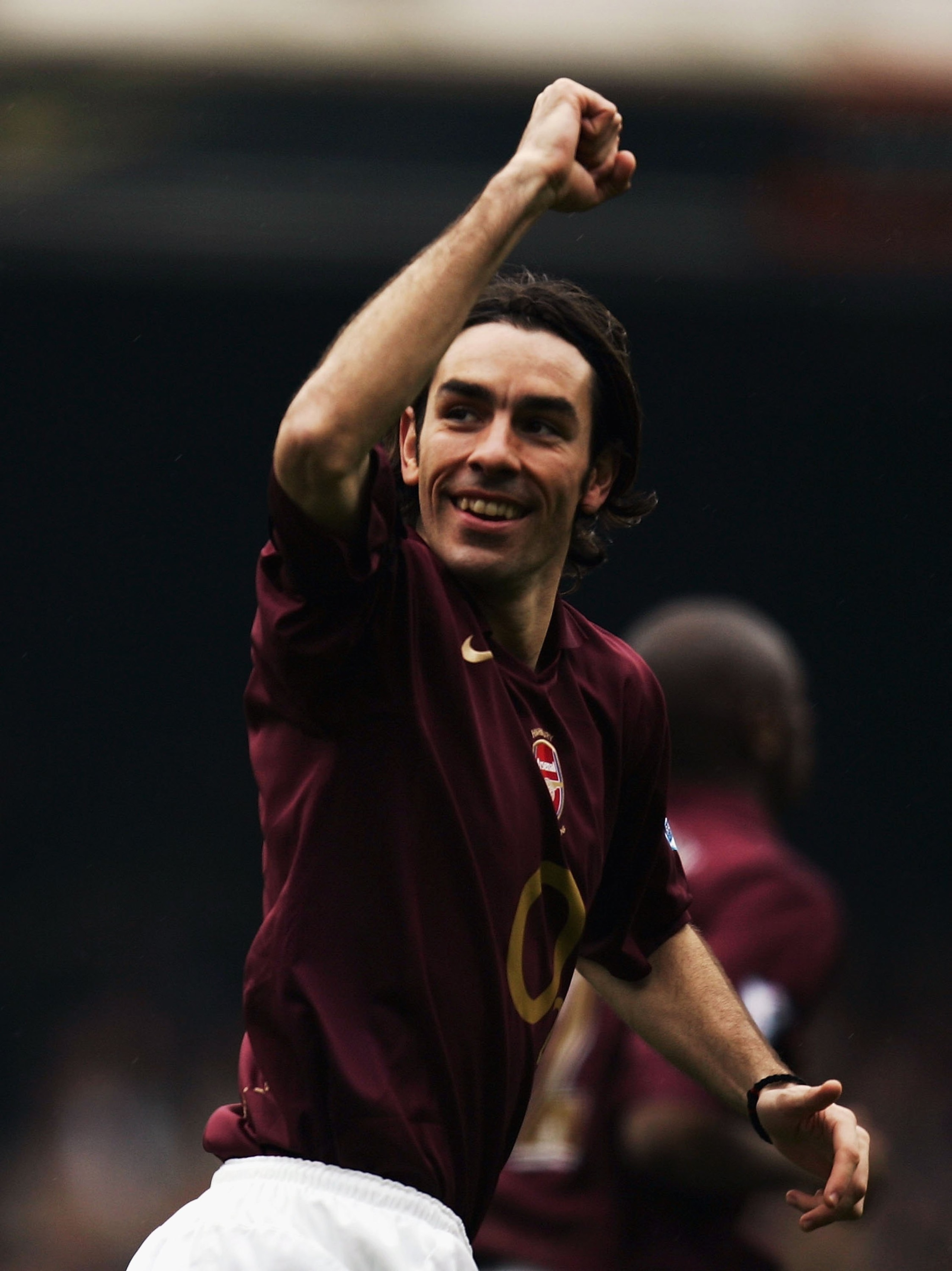 LONDON - APRIL 15:  Robert Pires of Arsenal celebrates Arsenal's second goal during the Barclays Premiership match between Arsenal and West Bromwich Albion at Highbury on April 15, 2006 in London, England.  (Photo by Paul Gilham/Getty Images)
