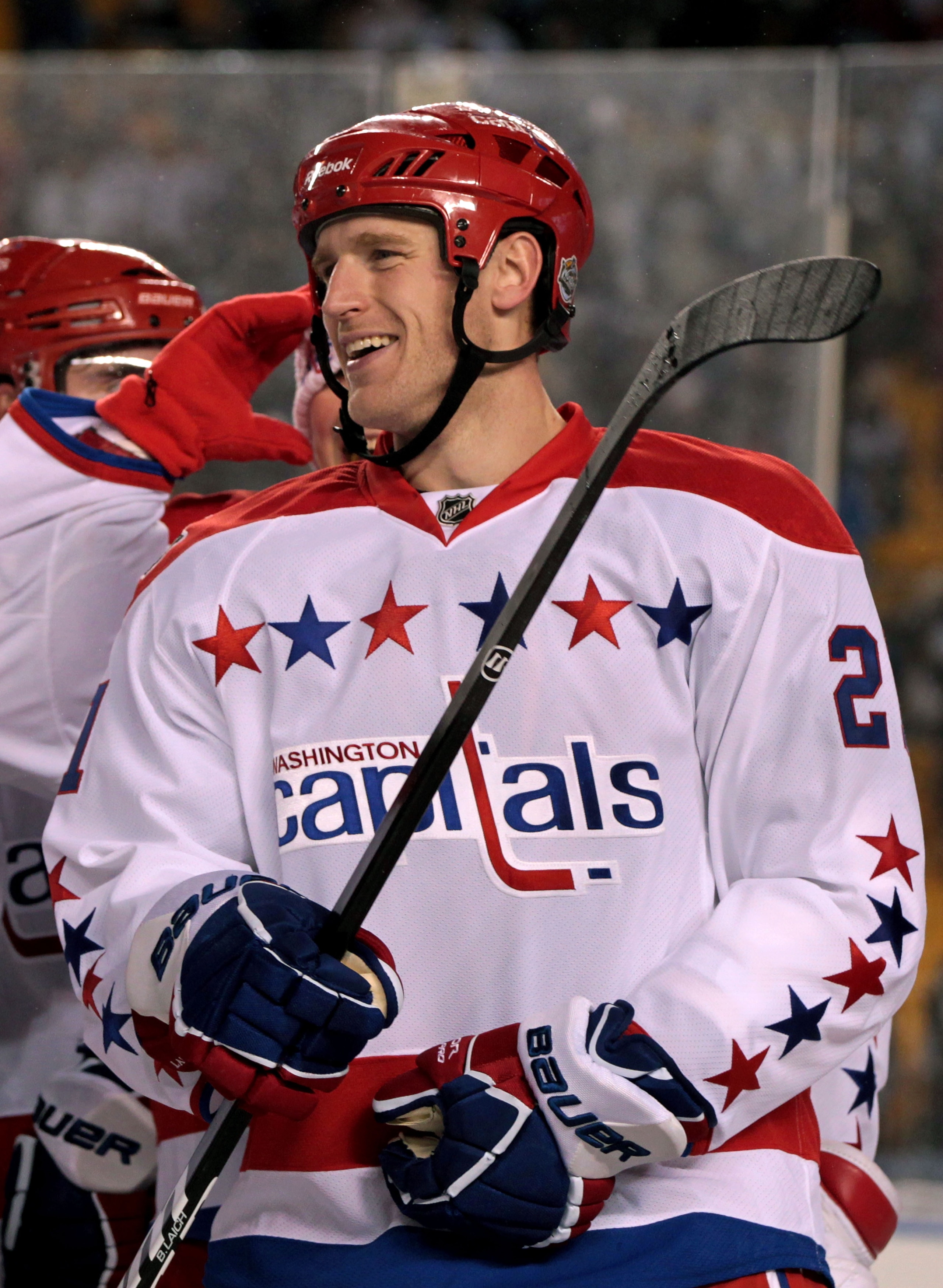 PITTSBURGH, PA - JANUARY 01:  Brooks Laich #21 of the Washington Capitals celebrates defeating Pittsburgh 3-1 during the 2011 NHL Bridgestone Winter Classic at Heinz Field on January 1, 2011 in Pittsburgh, Pennsylvania.  (Photo by Jamie Squire/Getty Image