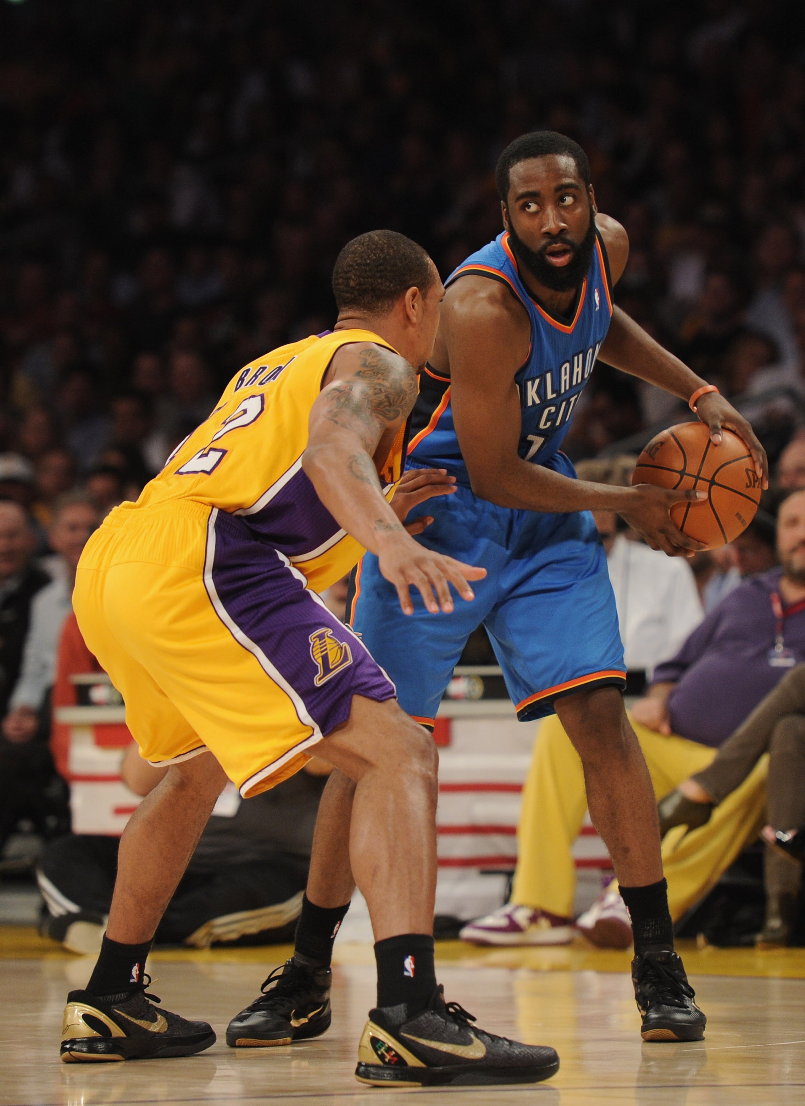 LOS ANGELES, CA - JANUARY 17: James Harden #13 of the Oklahoma City Thunder is guarded by Derek Fisher #2 of the Los Angeles Lakers at the Staples Center on January 17, 2011 in Los Angeles, California. NOTE TO USER: User expressly acknowledges and agre LOS ANGELES, CA - JANUARY 17: James Harden #13 of the Oklahoma City Thunder is guarded by Derek Fisher #2 of the Los Angeles Lakers at the Staples Center on January 17, 2011 in Los Angeles, California. NOTE TO USER: User expressly acknowledges and agre