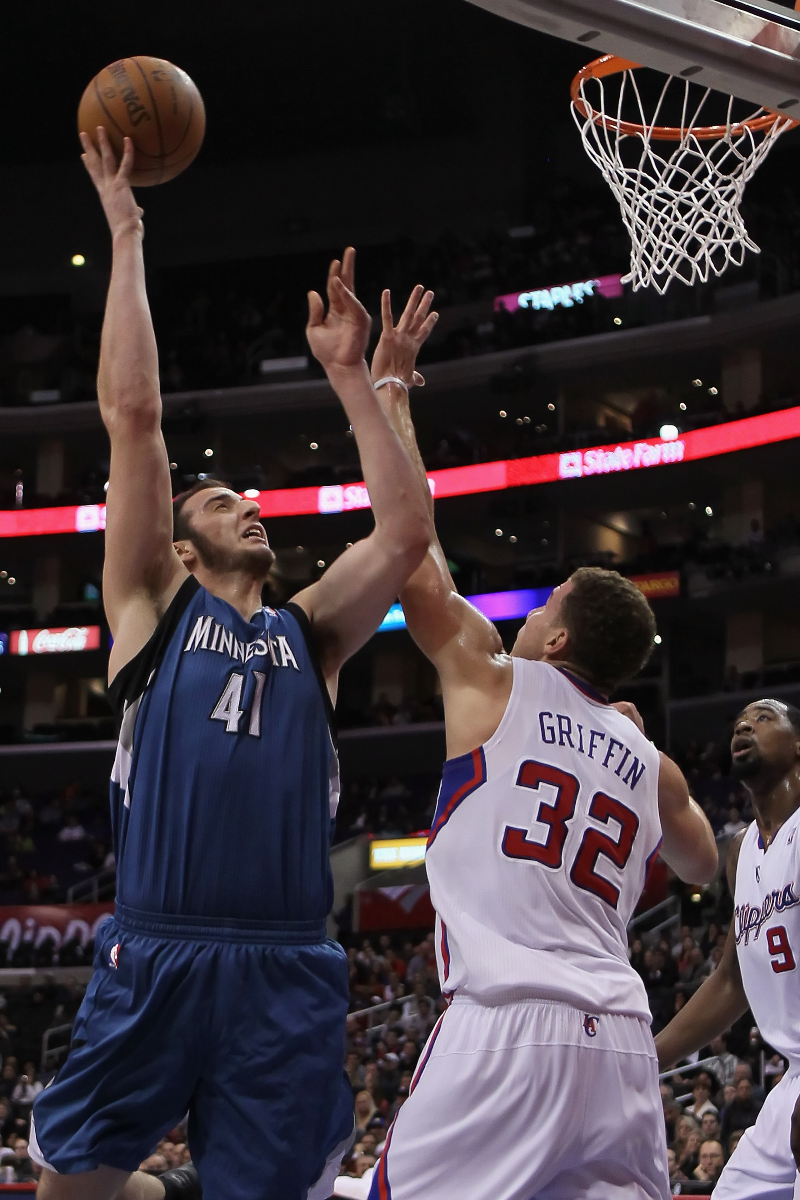 LOS ANGELES, CA - DECEMBER 20:  Kosta Koufos #41 of the Minnesota Timberwolves drives to the basket over Blake Griffin #32 of the Los Angeles Clippers during the first half at Staples Center on December 20, 2010 in Los Angeles, California. NOTE TO USER: U