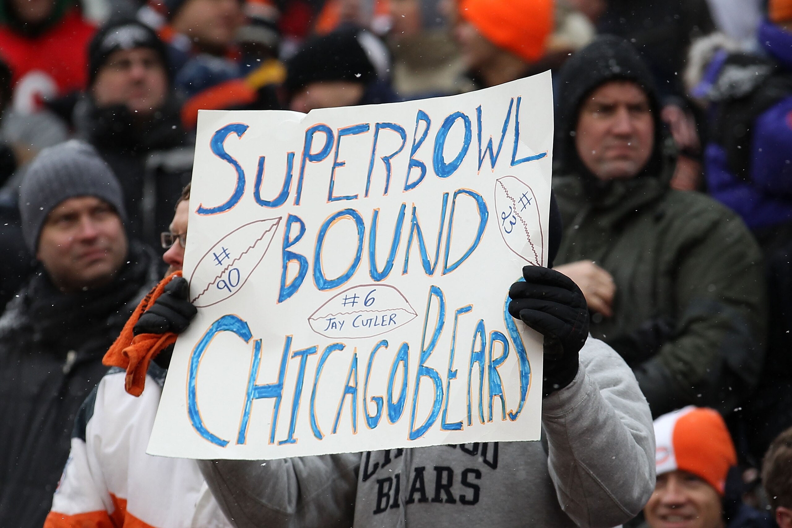 CHICAGO, IL - JANUARY 16:  A Chicago Bears fan holds up a as the Bears take on the Seattle Seahawks in the 2011 NFC divisional playoff game at Soldier Field on January 16, 2011 in Chicago, Illinois.  (Photo by Jonathan Daniel/Getty Images)