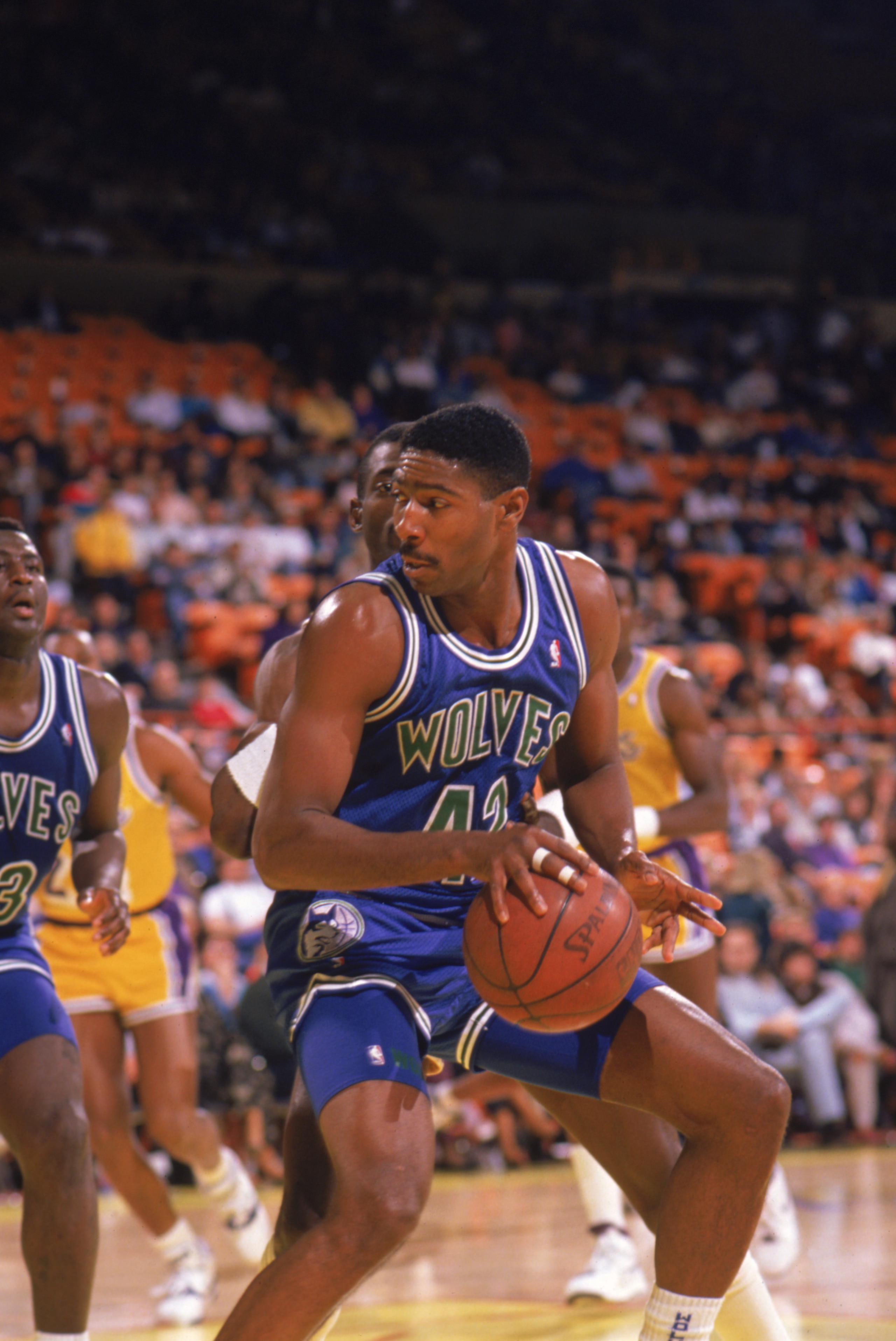 LOS ANGELES - 1990:  Sam Mitchell #42 of the Minnesota Timberwolves dribble drives the ball during a game against the Los Angeles Lakers at the Great Western Forum in Los Angeles, California during the 1989-1990 NBA season.  (Photo by Ken Levine/Getty Ima
