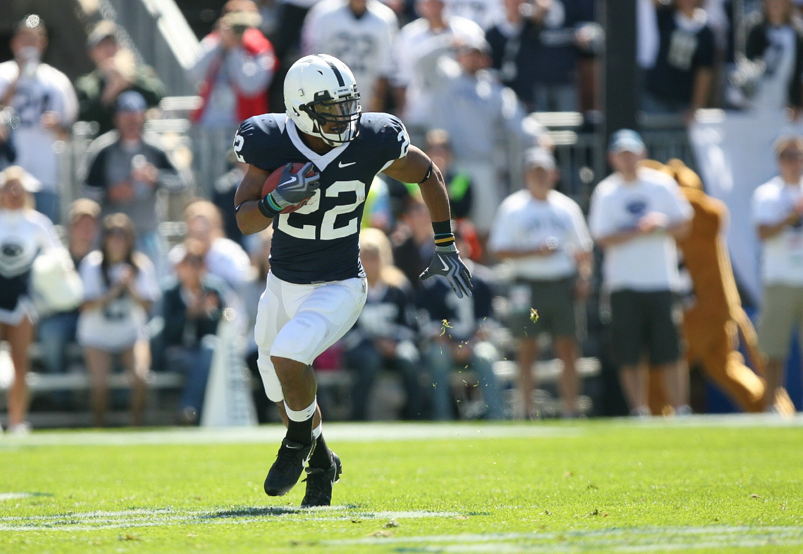 STATE COLLEGE, PA - SEPTEMBER 19: Running back Evan Royster #22 of the Penn State Nittany Lions carries the ball during a game against the Temple Owls on September 19, 2009 at Beaver Stadium in State College, Pennsylvania. (Photo by Hunter Martin/Getty Im