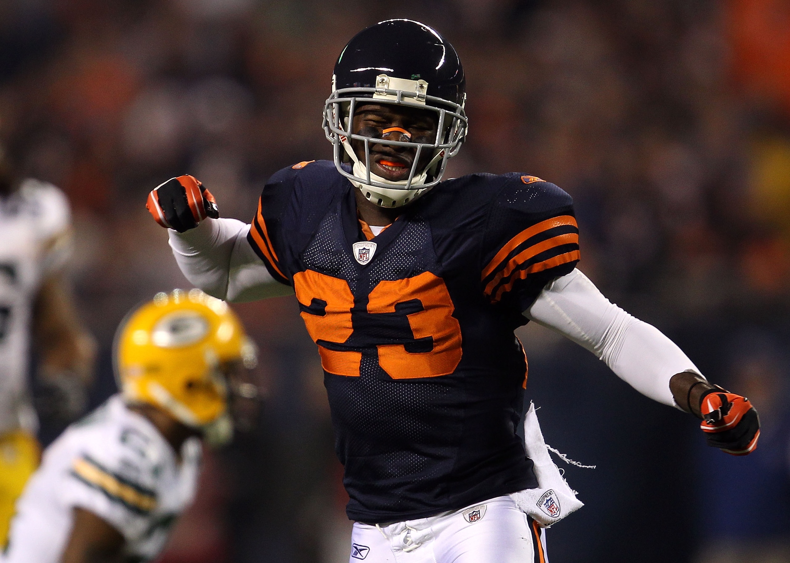 CHICAGO - SEPTEMBER 27:  Devin Hester #23 of the Chicago Bears reacts after he was interfered with on a pass play in the first quarter against Charles Woodson #21 of the Green Bay Packers at Soldier Field on September 27, 2010 in Chicago, Illinois.  (Phot