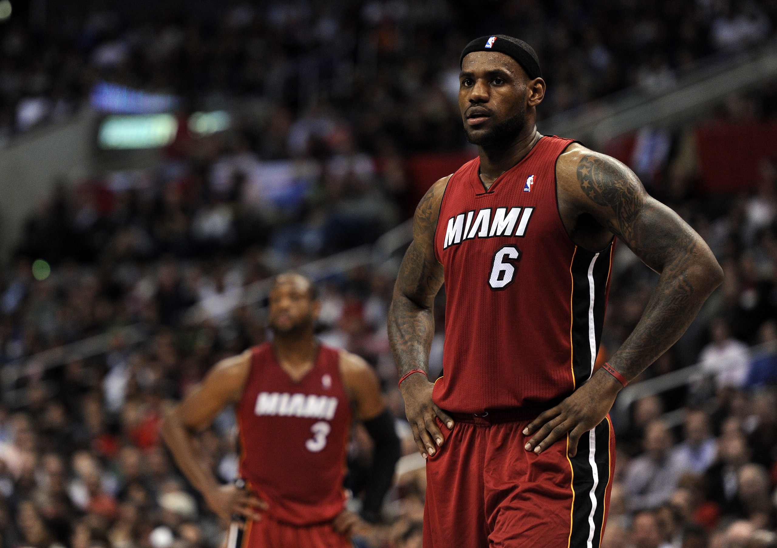 LOS ANGELES, CA - JANUARY 12:  LeBron James #6 and Dwyane Wade #3 of the Miami Heat wait during a freethrow against the Los Angeles Clippers at Staples Center on January 12, 2011 in Los Angeles, California.  NOTE TO USER: User expressly acknowledges and a