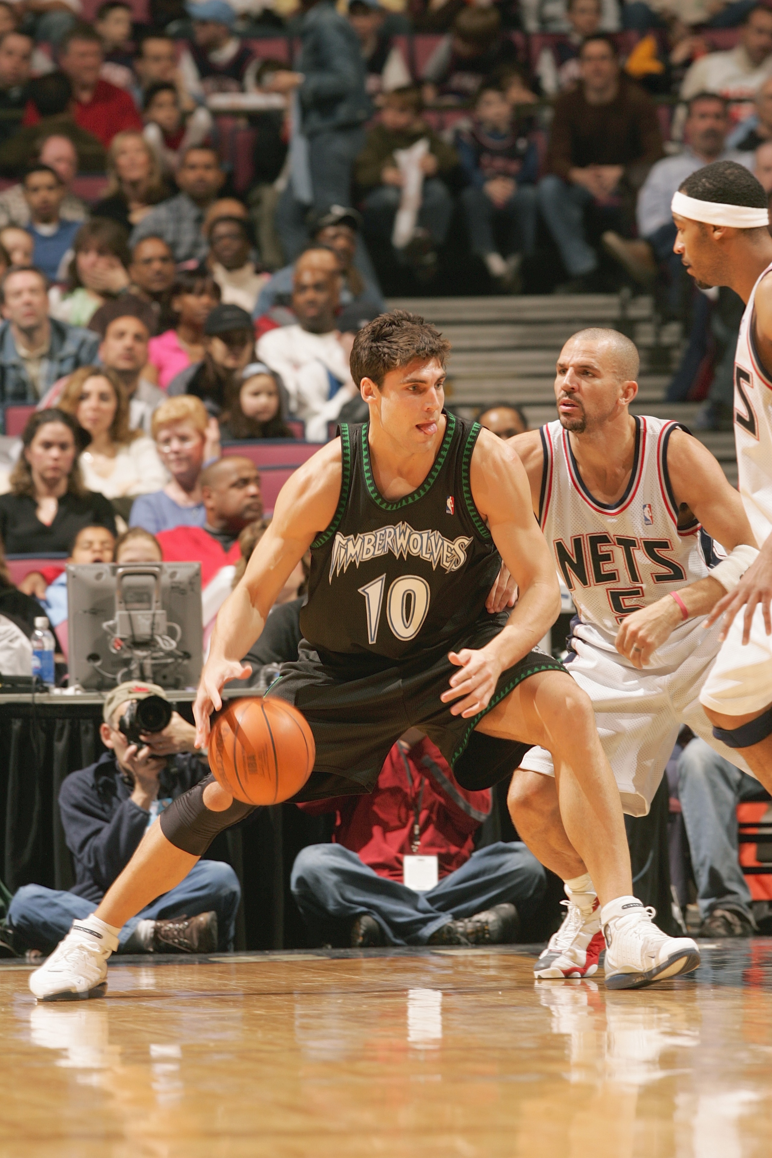 EAST RUTHERFORD, NJ - MARCH 26:  Wally Szczerbiak #10 of the Minnesota Timberwolves dribbles against Jason Kidd #5 of the New Jersey Nets during the game on March 26, 2005 at Continental Airlines Arena in East Rutherford, New Jersey.  The Timberwolves won