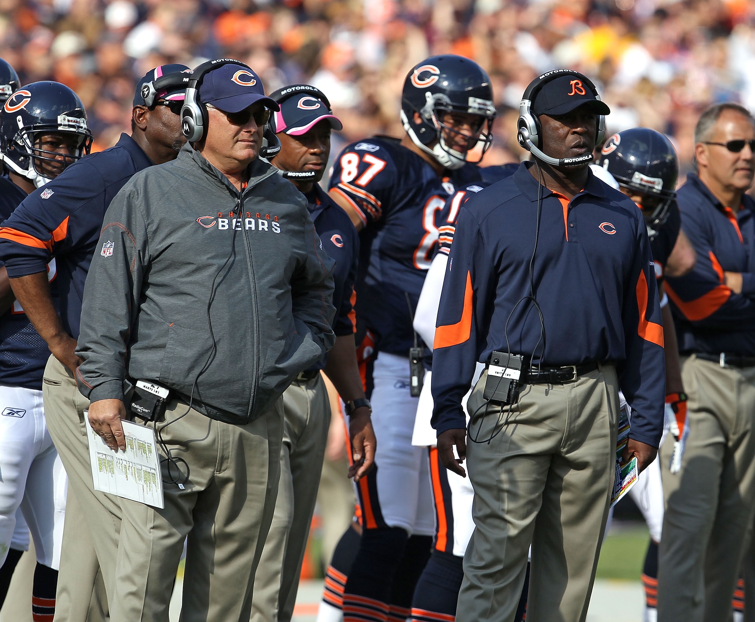 CHICAGO - OCTOBER 24: Offensive coordinator Mike Martz (L) and head coach Lovie Smith of the Chicago Bears watch as their team takes on the Washington Redskins at Soldier Field on October 24, 2010 in Chicago, Illinois. The Redskins defeated the Bears 17-1